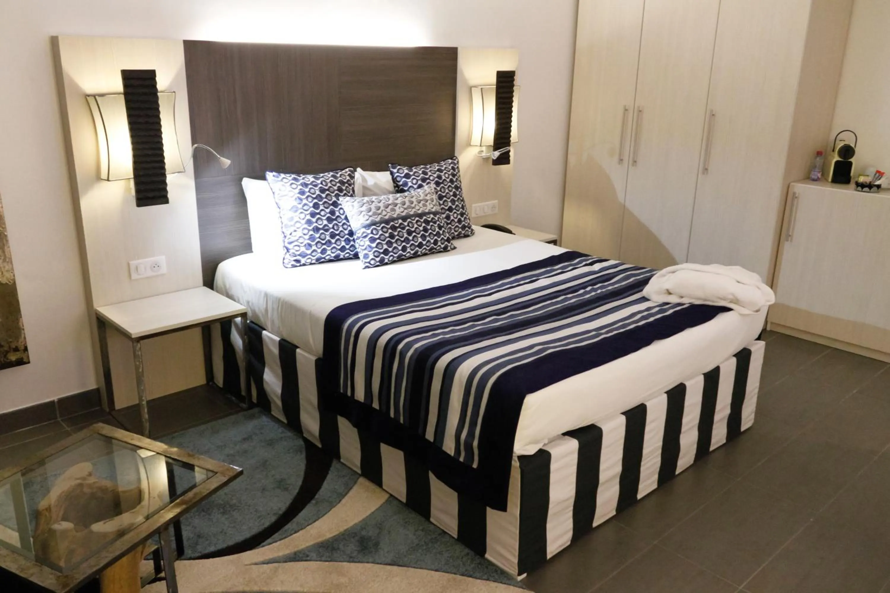 Bed in ONOMO Hotel Lomé