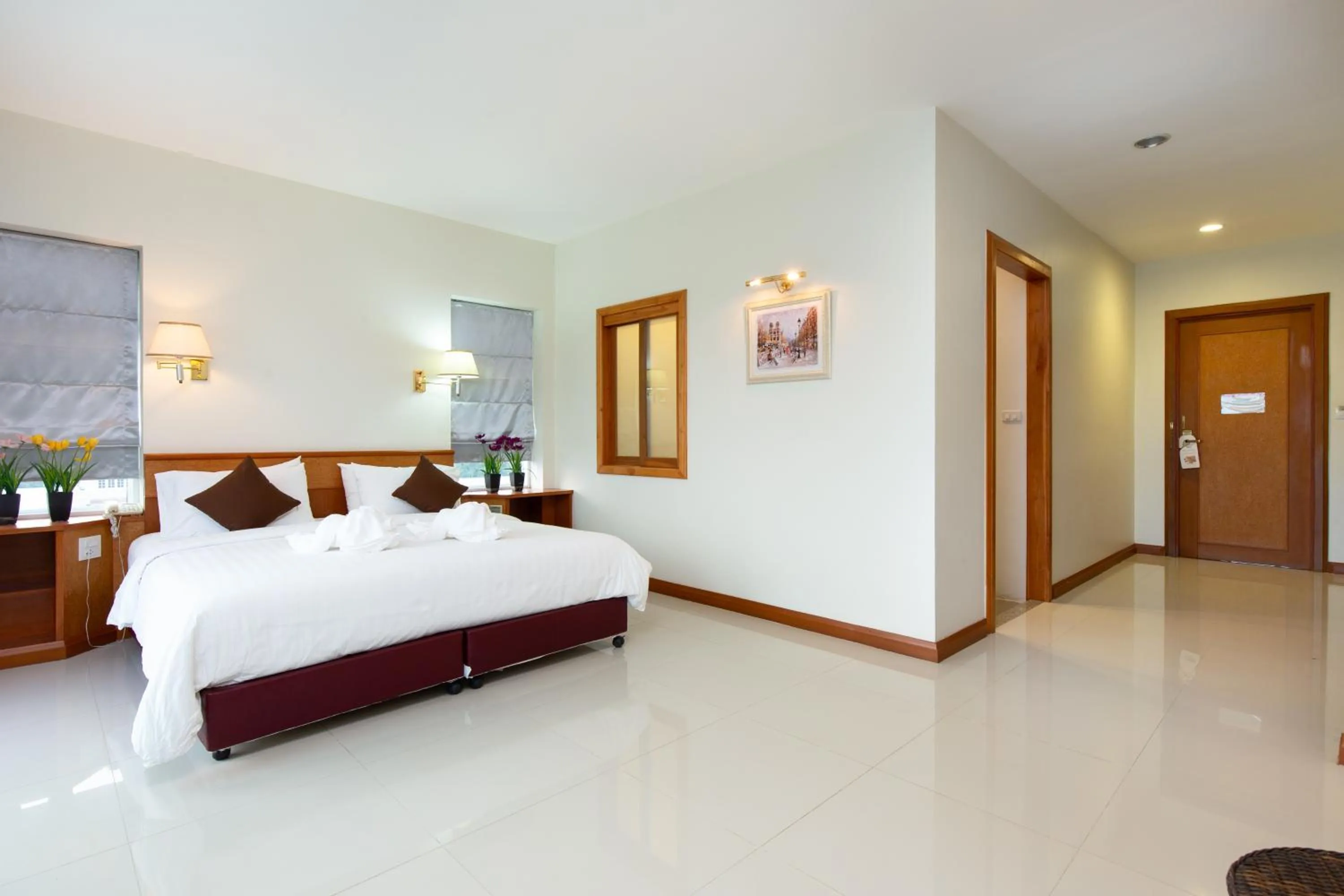 Bed in Kanchanaburi City Hotel