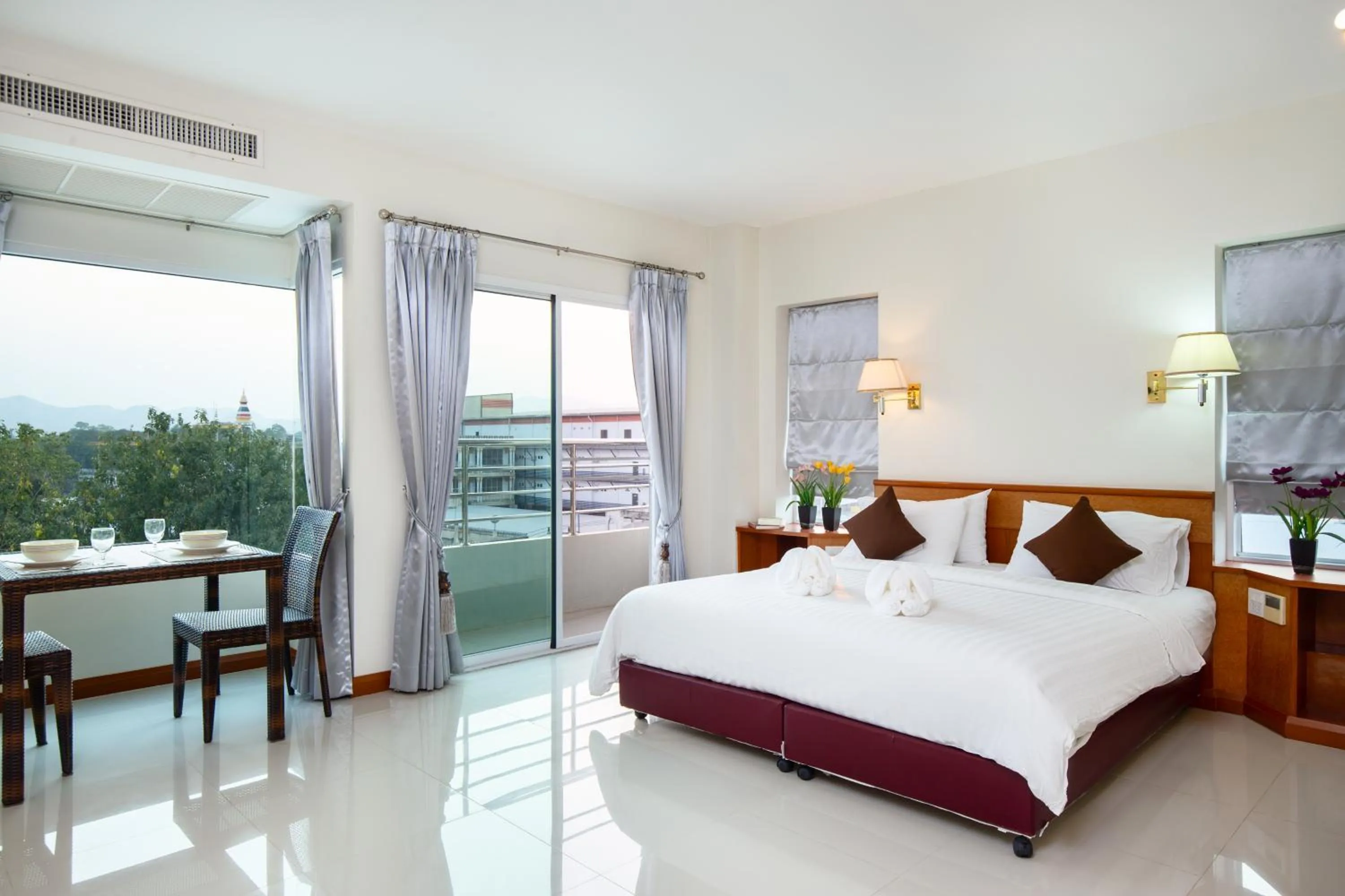 Bed in Kanchanaburi City Hotel