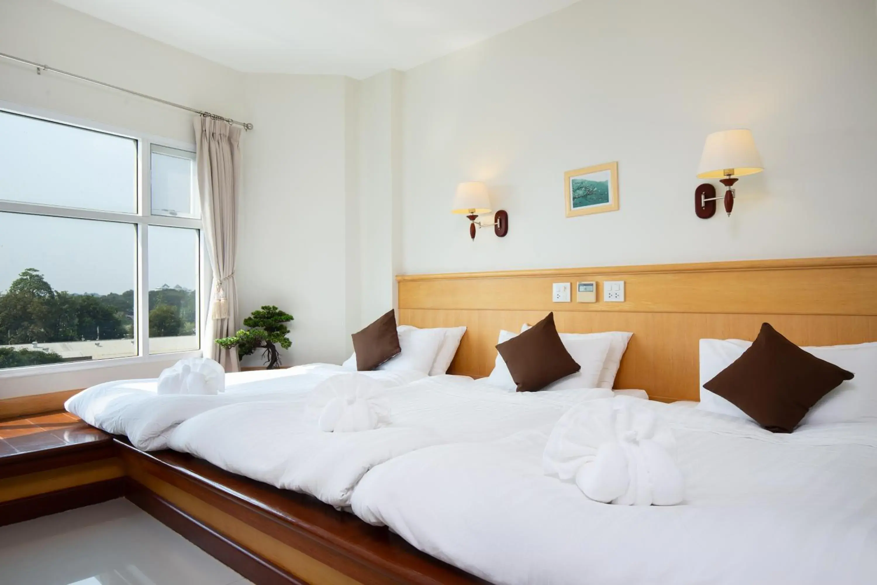 Bed in Kanchanaburi City Hotel Bed in Kanchanaburi City Hotel