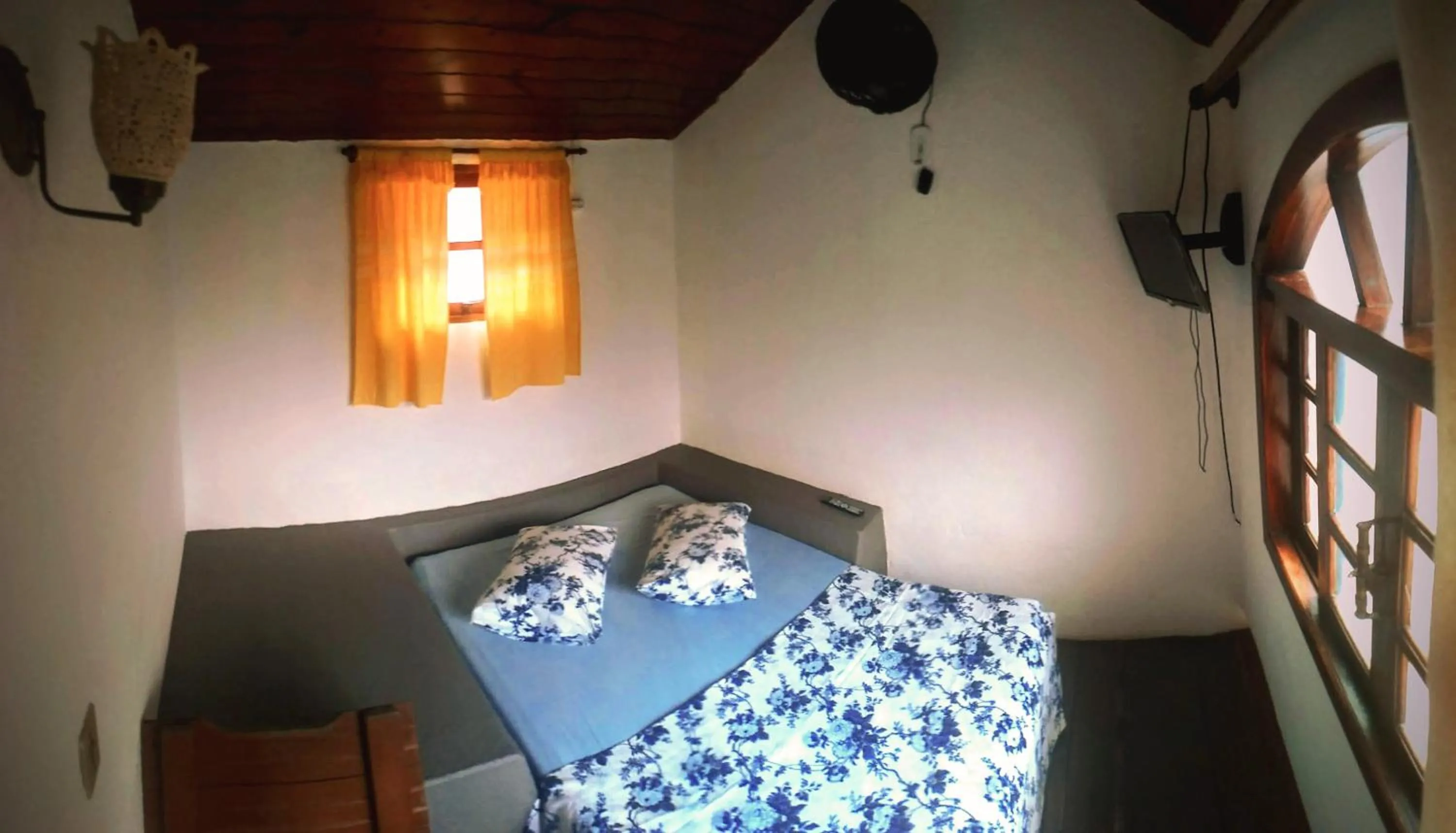 Bed in Pousada Em Busca do Sol