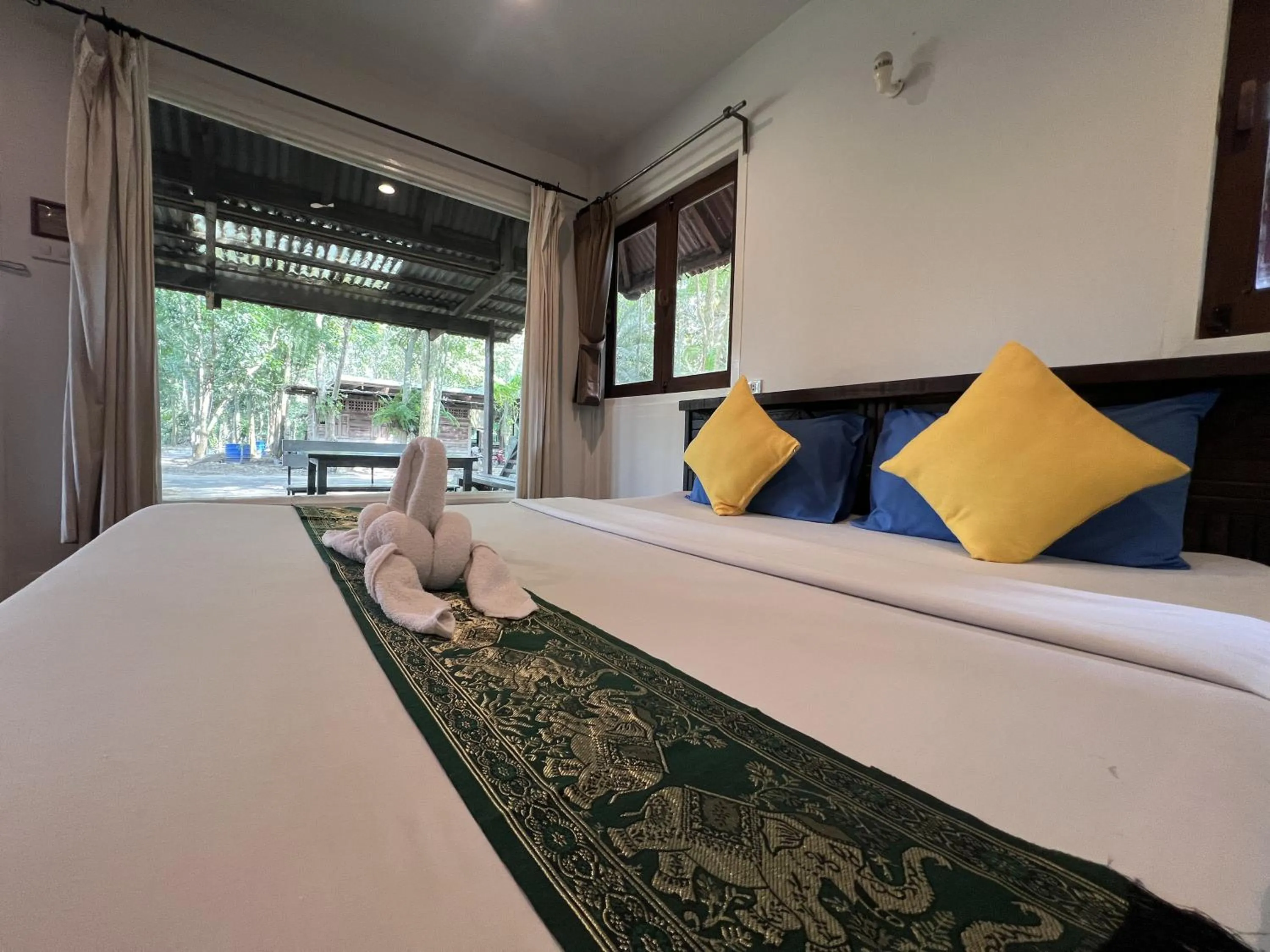 Bed in Pang Mai Resort