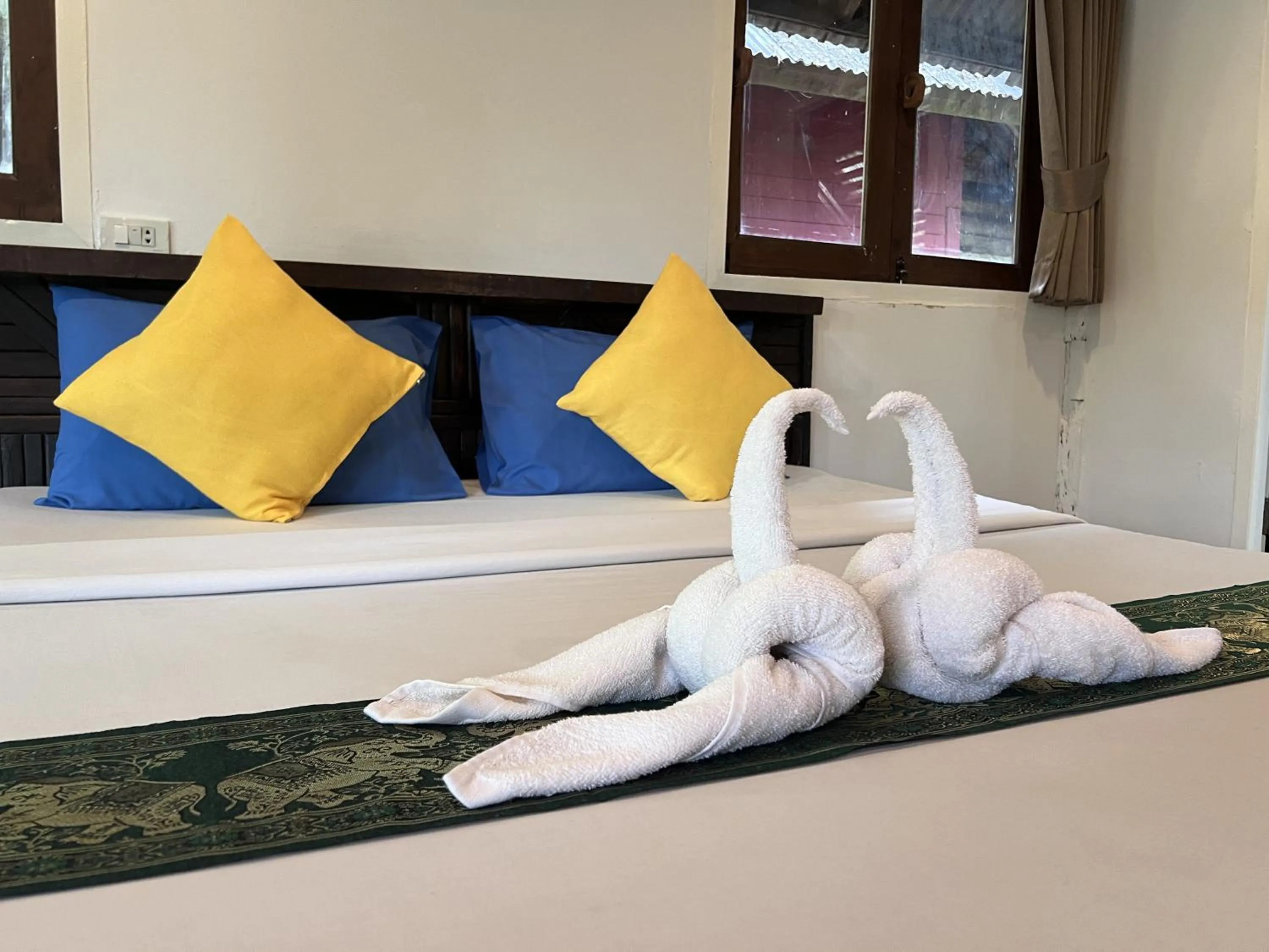 Bed in Pang Mai Resort