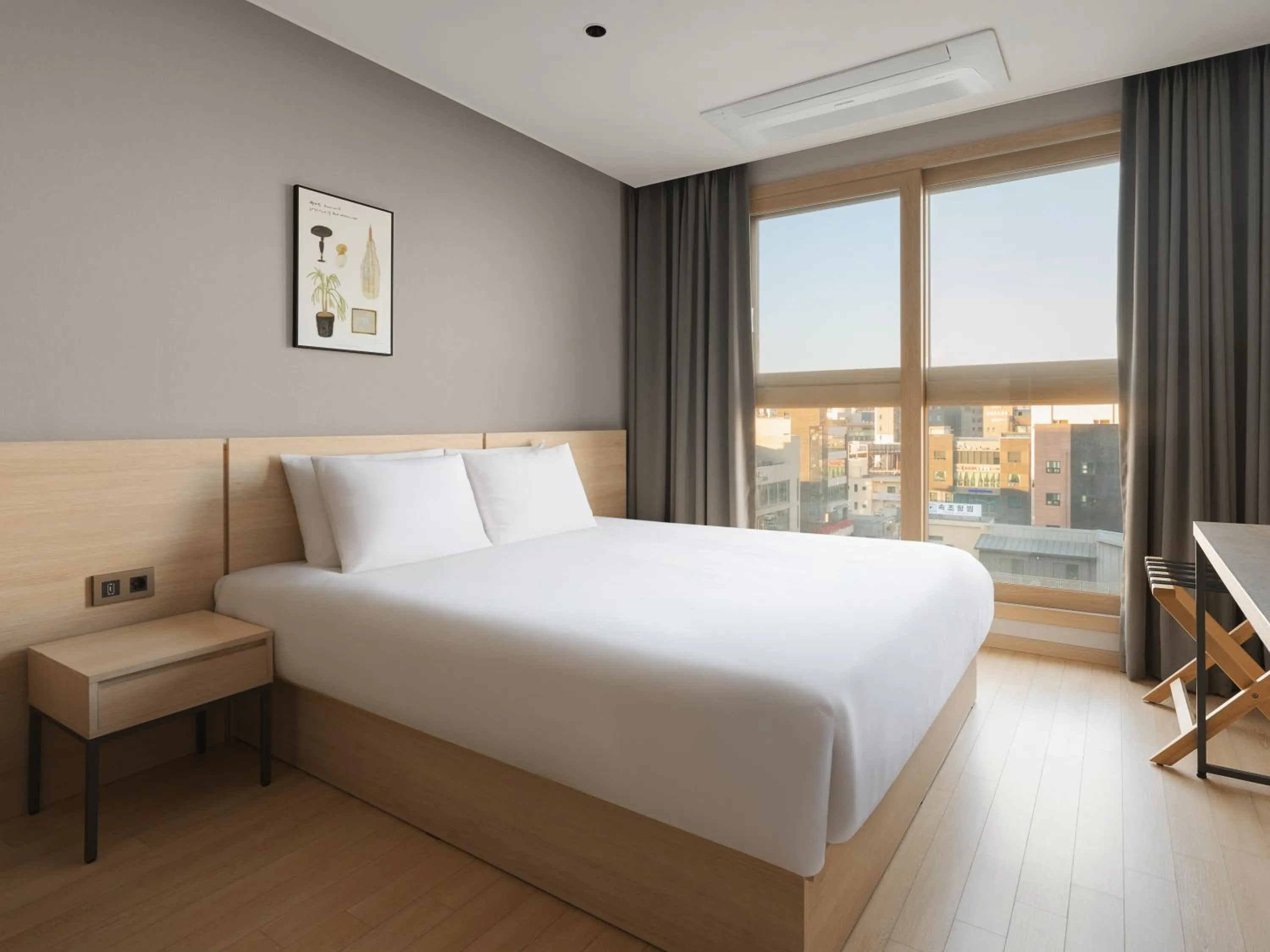 Bed in Le Collective Sokcho Central