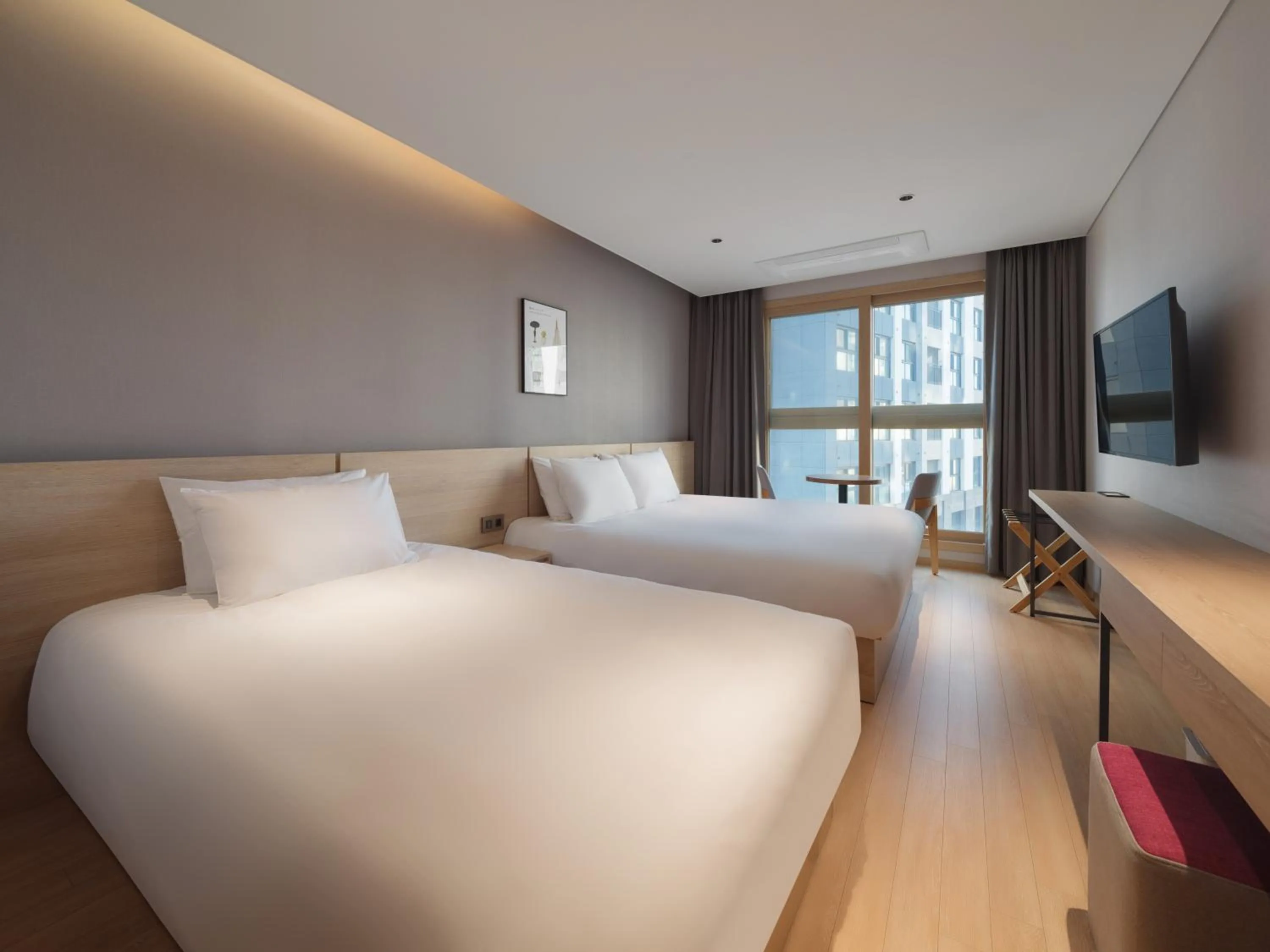 Bed in Le Collective Sokcho Central