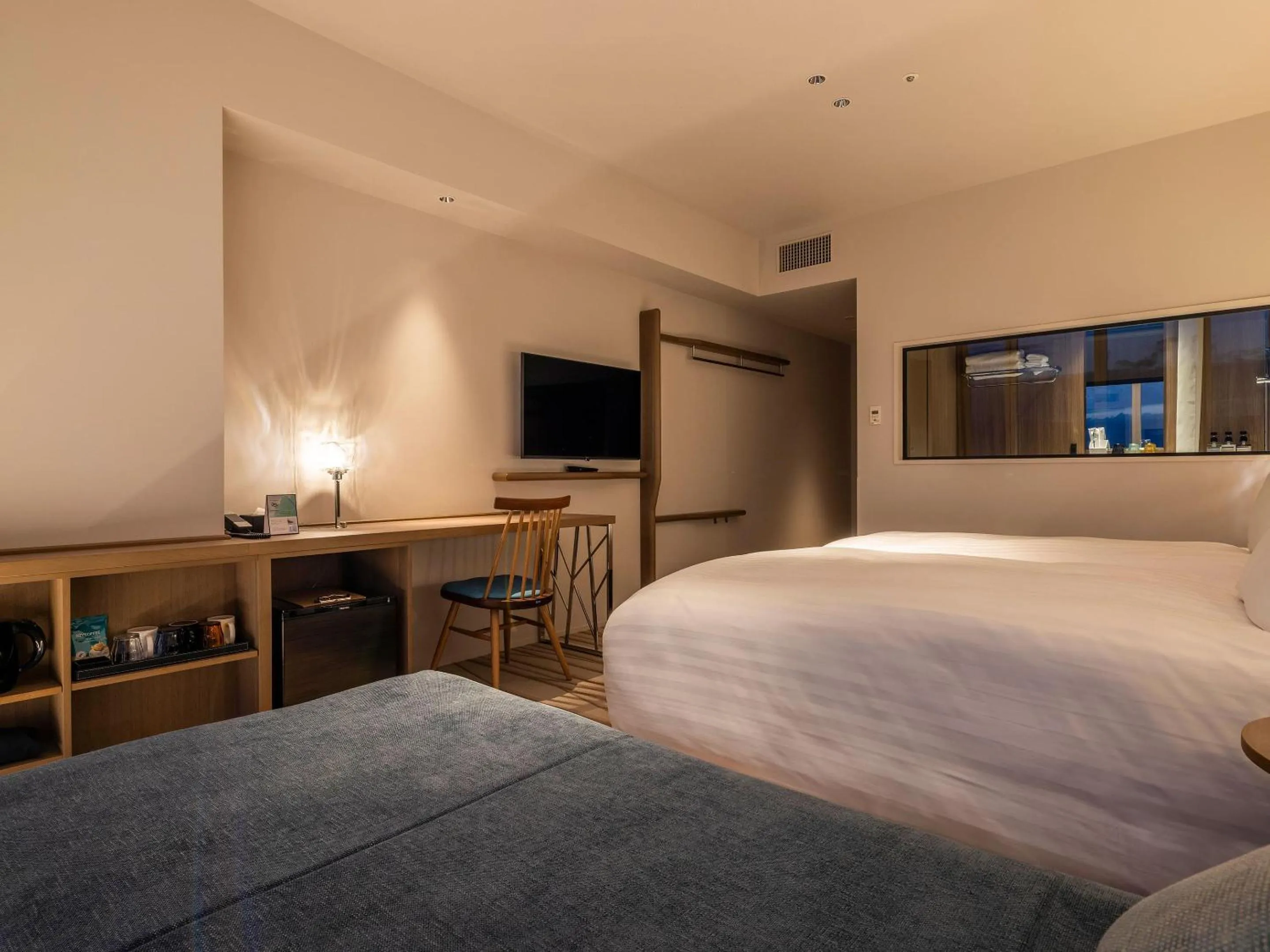 Photo of the whole room, Bed in SAPPORO HOTEL by GRANBELL