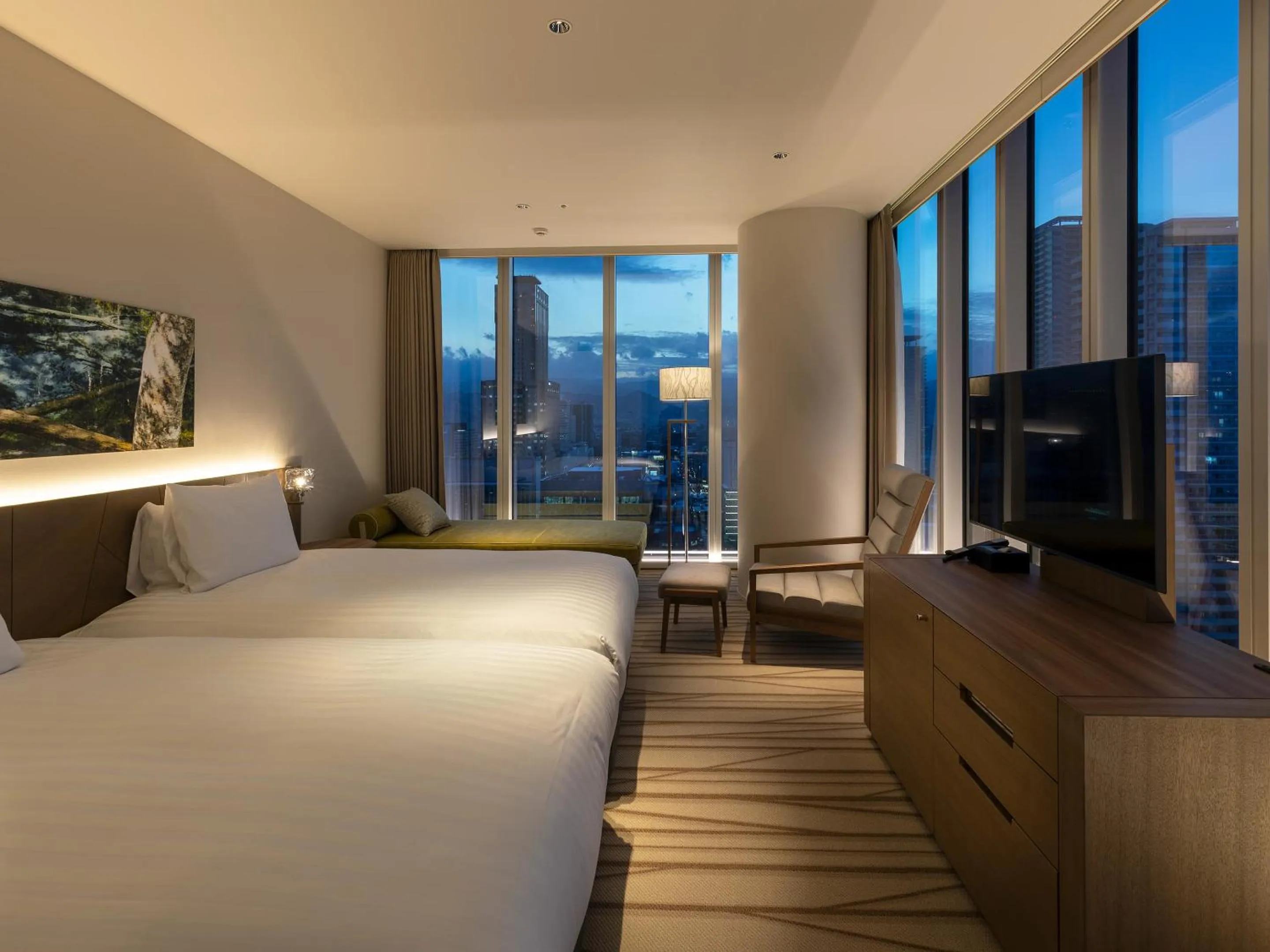 Photo of the whole room, Bed in SAPPORO HOTEL by GRANBELL