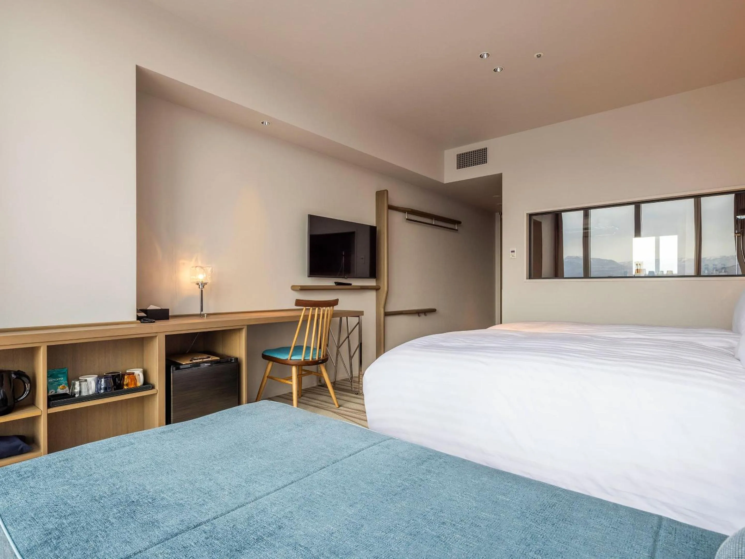 Photo of the whole room, Bed in SAPPORO HOTEL by GRANBELL