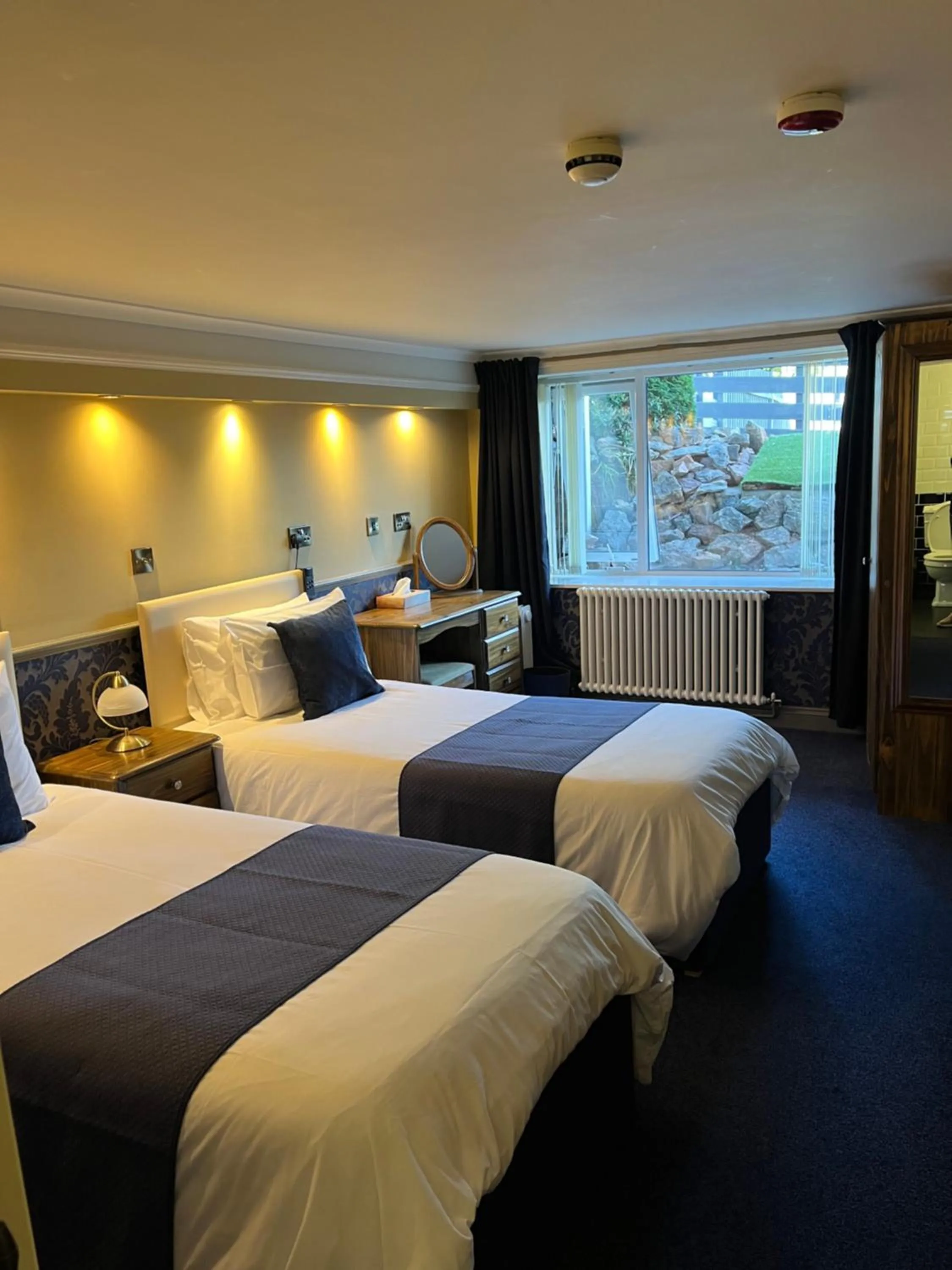 Bed in Atlantis Holiday Apartments