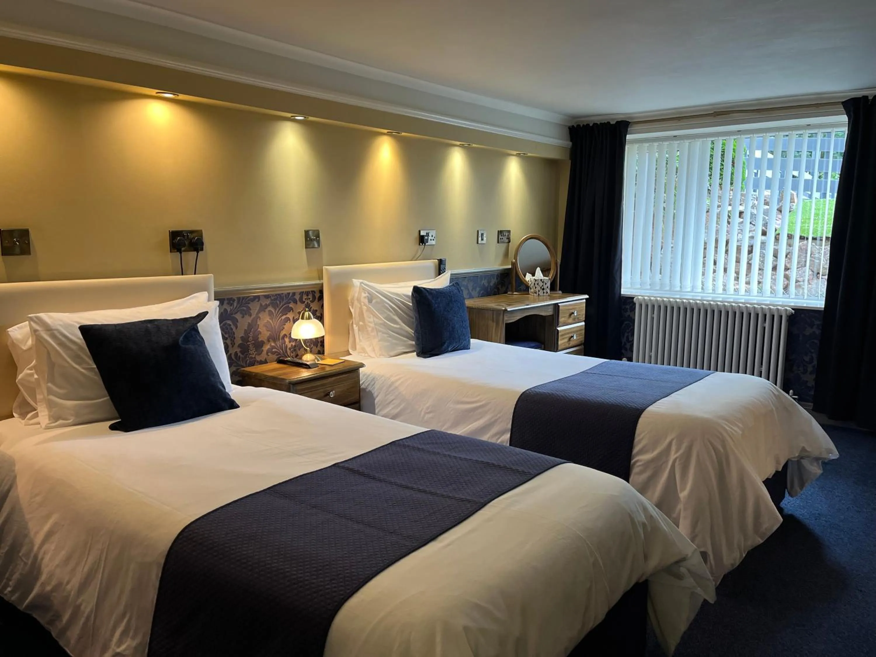 Bed in Atlantis Holiday Apartments