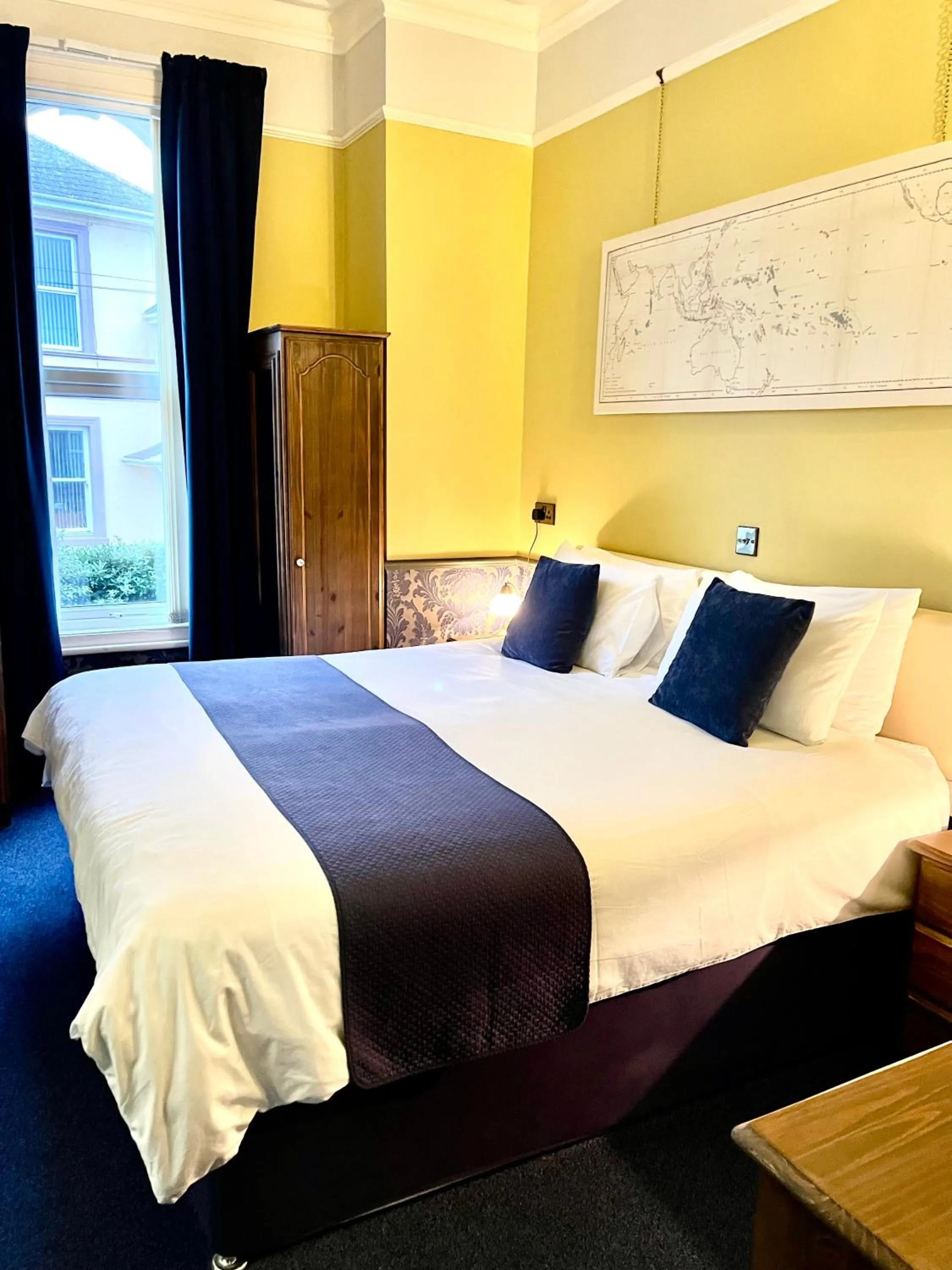 Bed in Atlantis Holiday Apartments