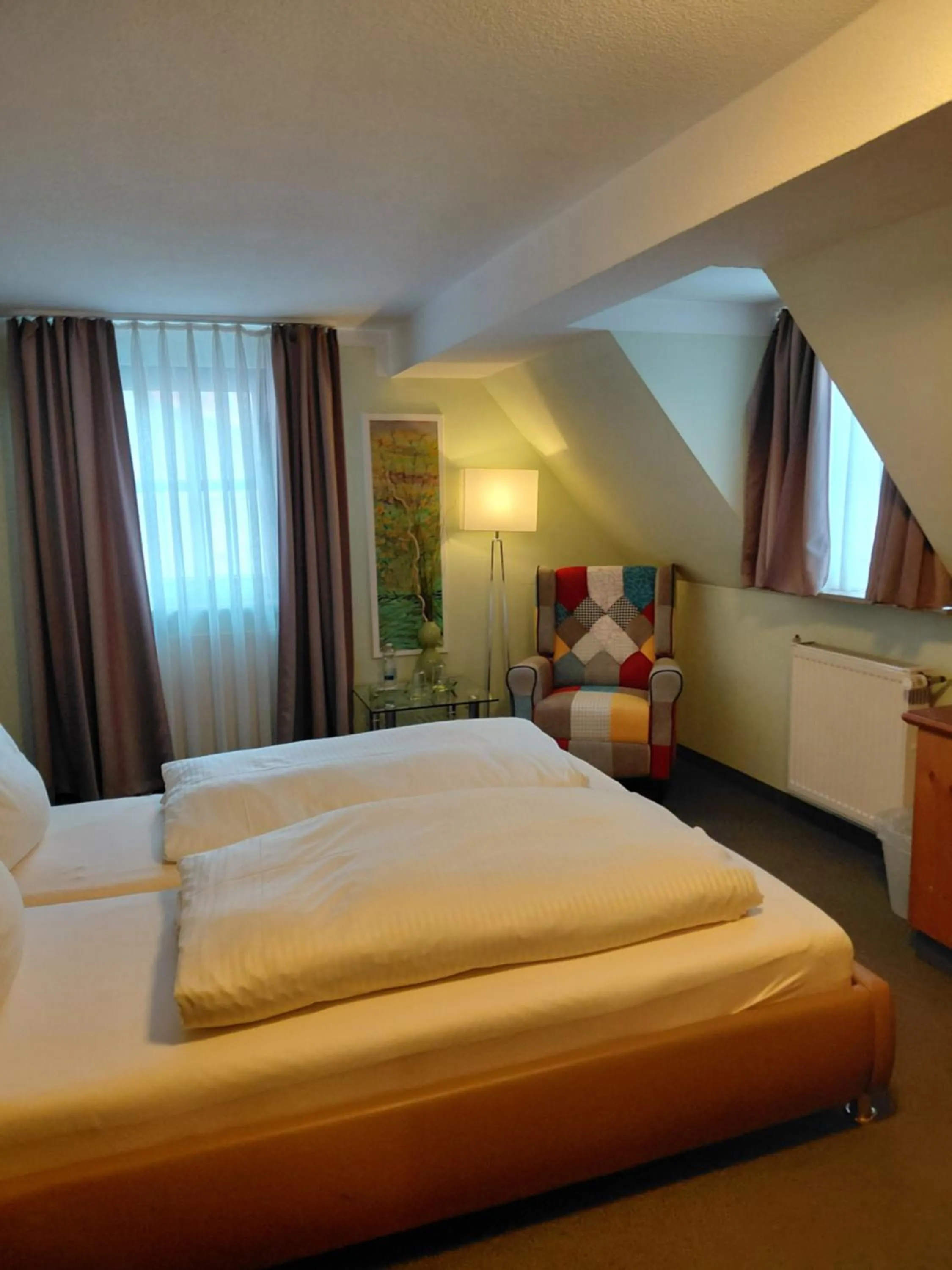 Bed in Gästehaus Engelgasse Herzogenaurach