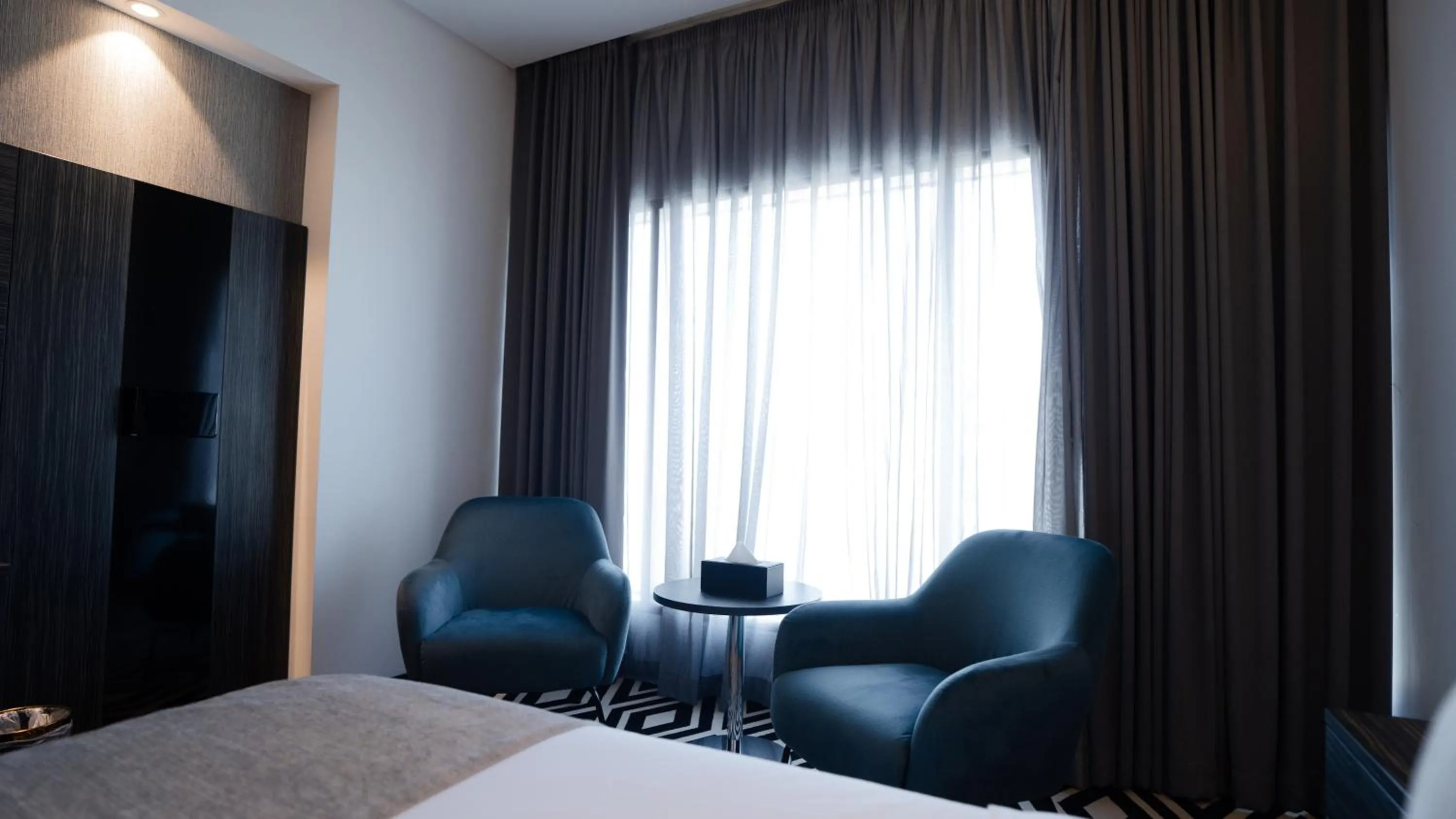 Seating area, Bed in Mirada Blue Falestine - Serviced Apartments