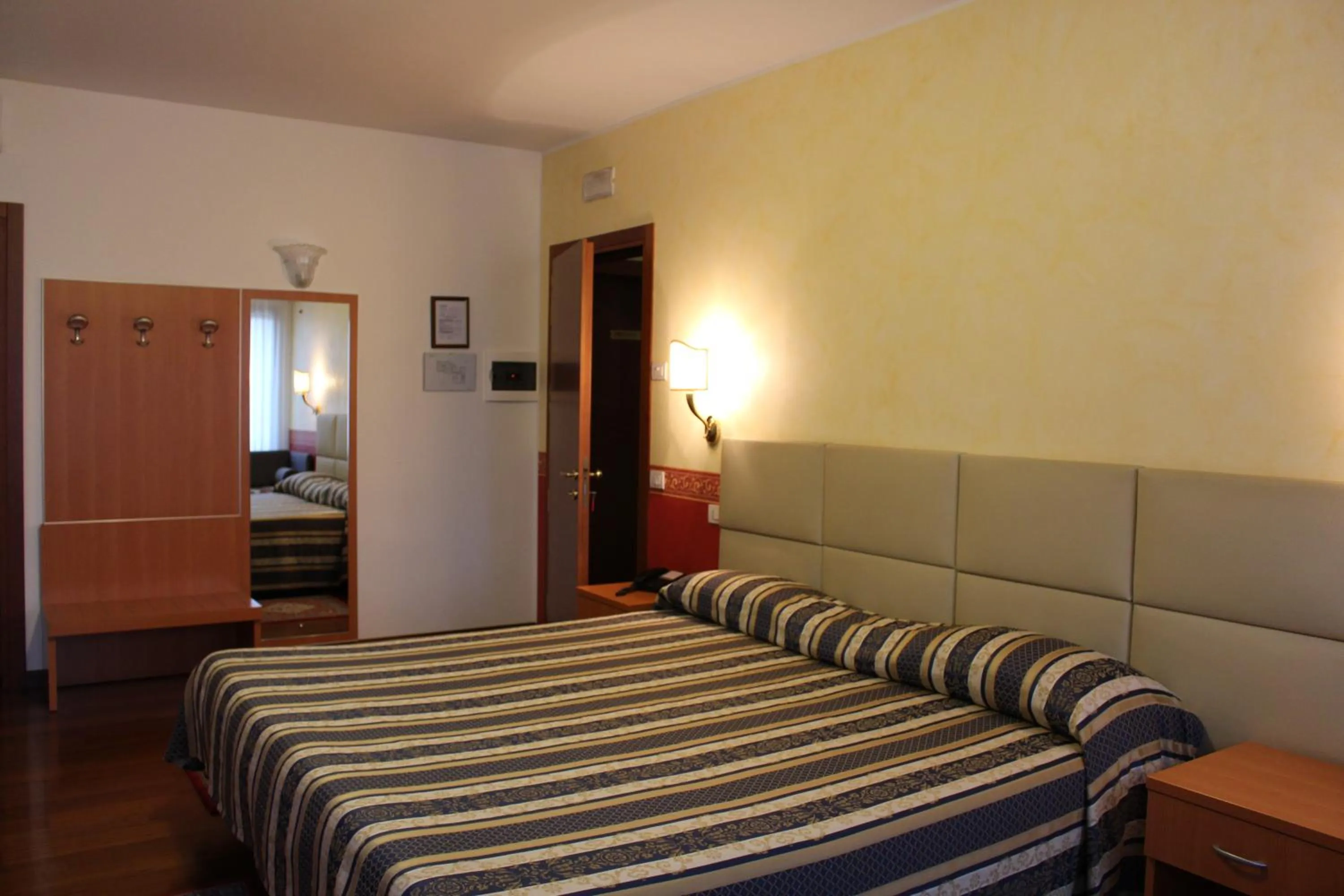 Photo of the whole room, Bed in Hotel Ristorante Dotto