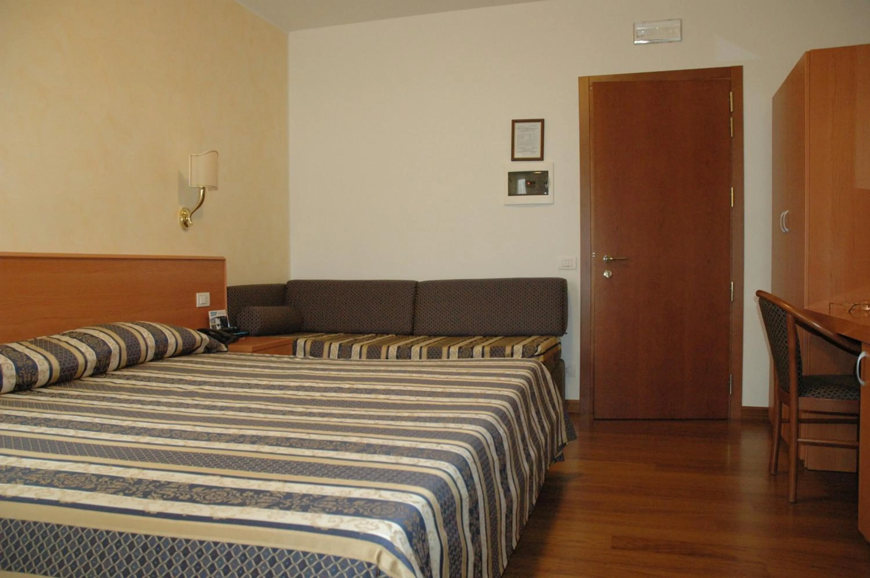 Photo of the whole room, Bed in Hotel Ristorante Dotto