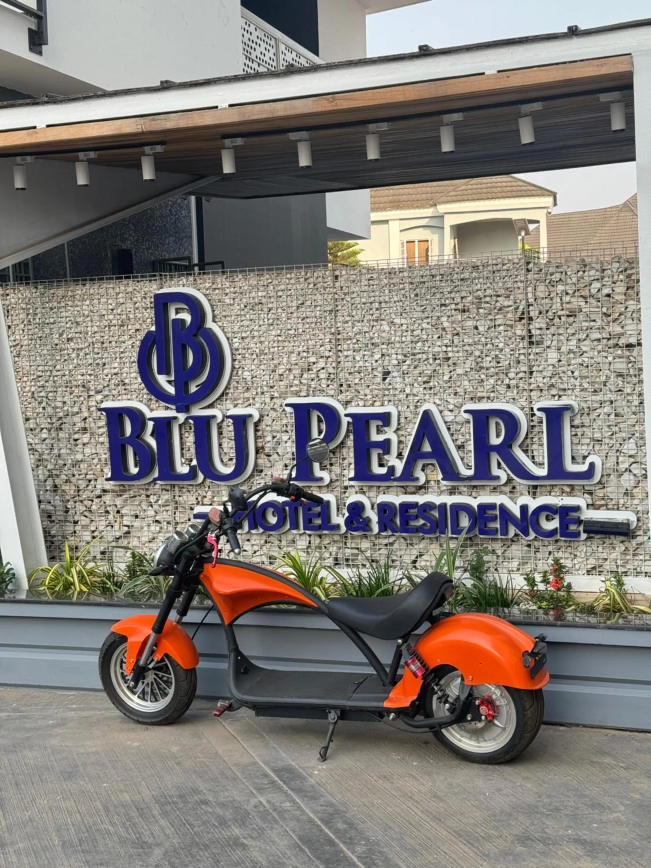 Property logo or sign in Blu Pearl Hotel & Residence