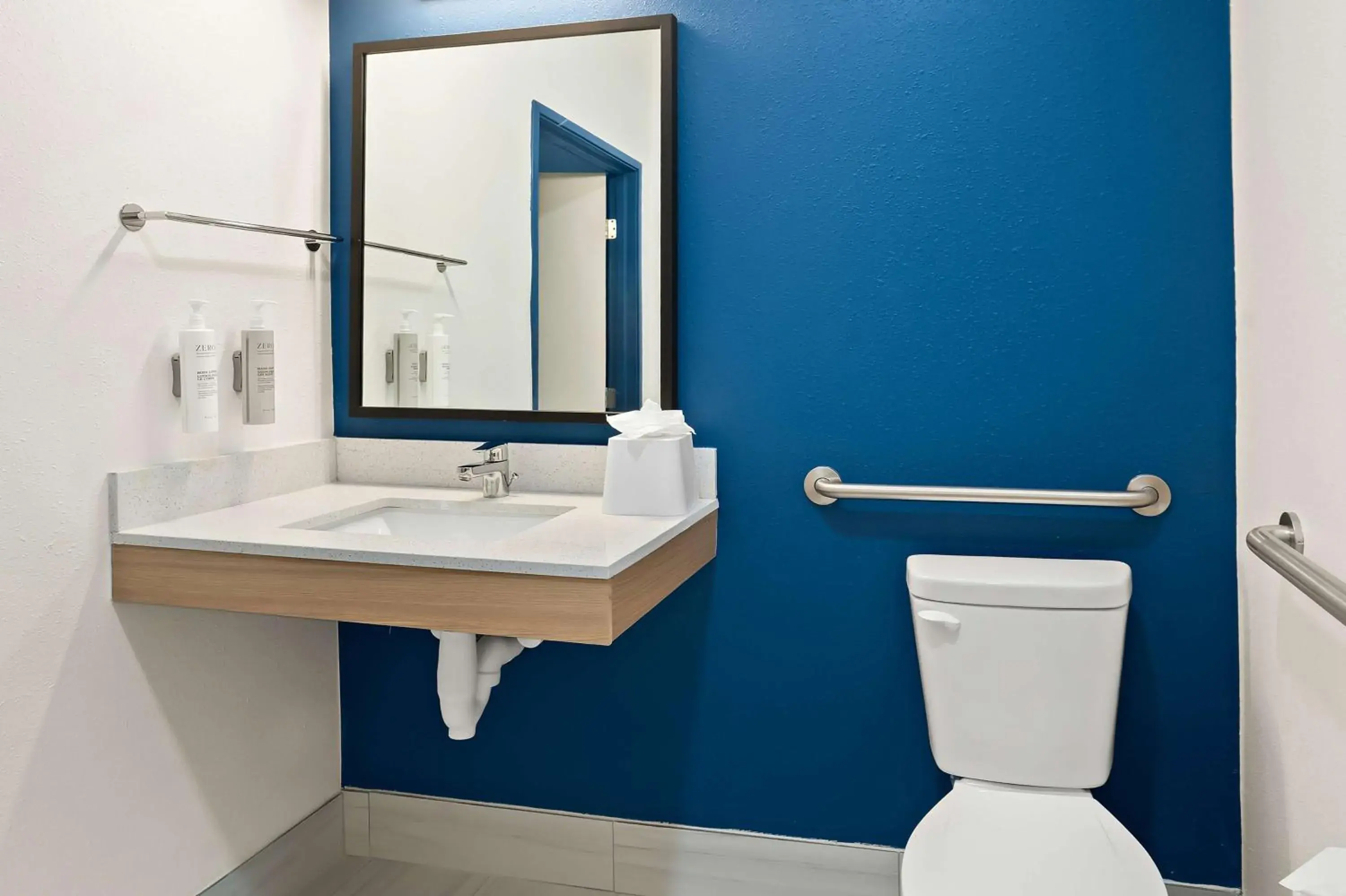 Bathroom in Spark By Hilton Moline Quad Cities Bathroom in Spark By Hilton Moline Quad Cities