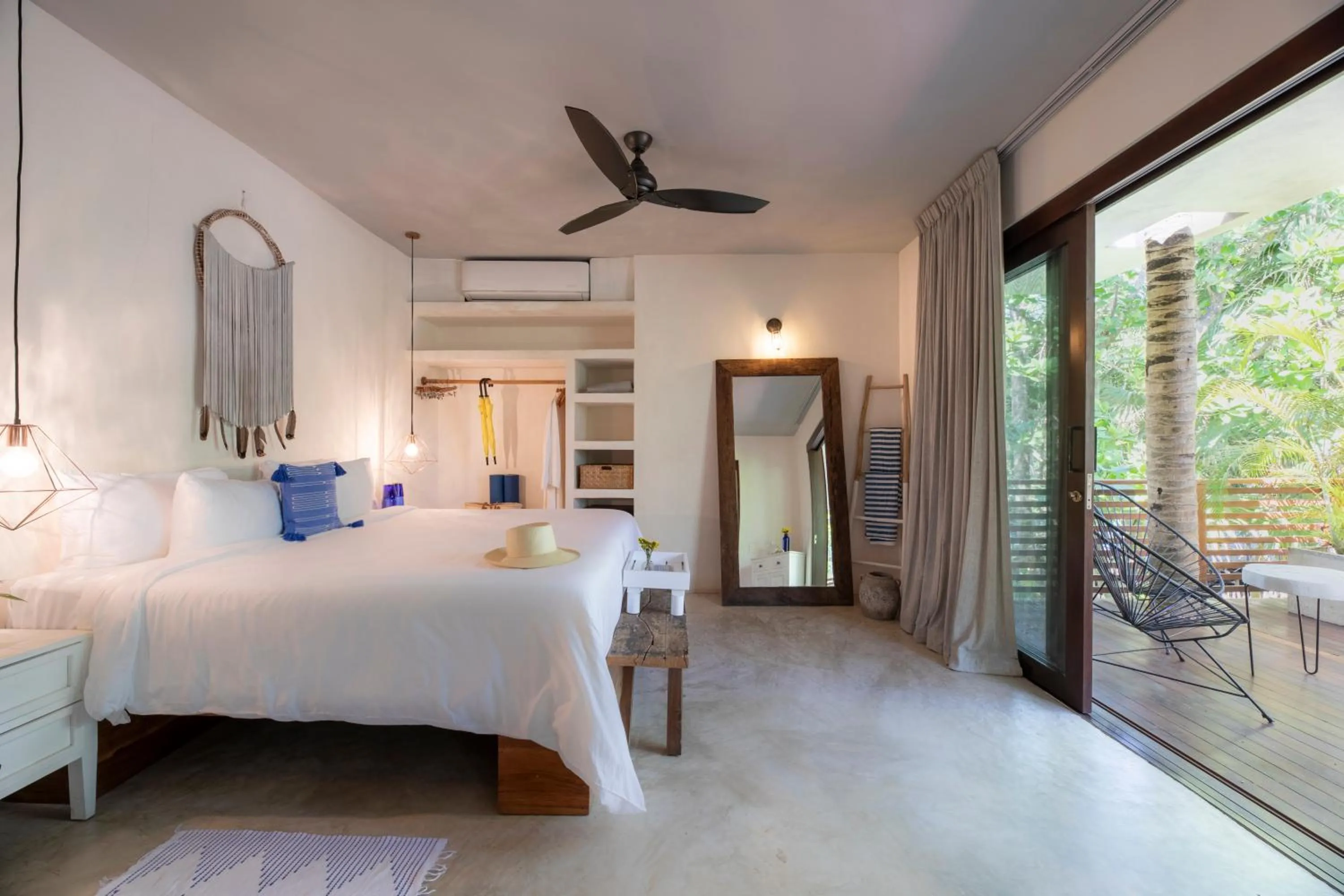 Bed in La Zebra Tulum, a Small Luxury Hotel