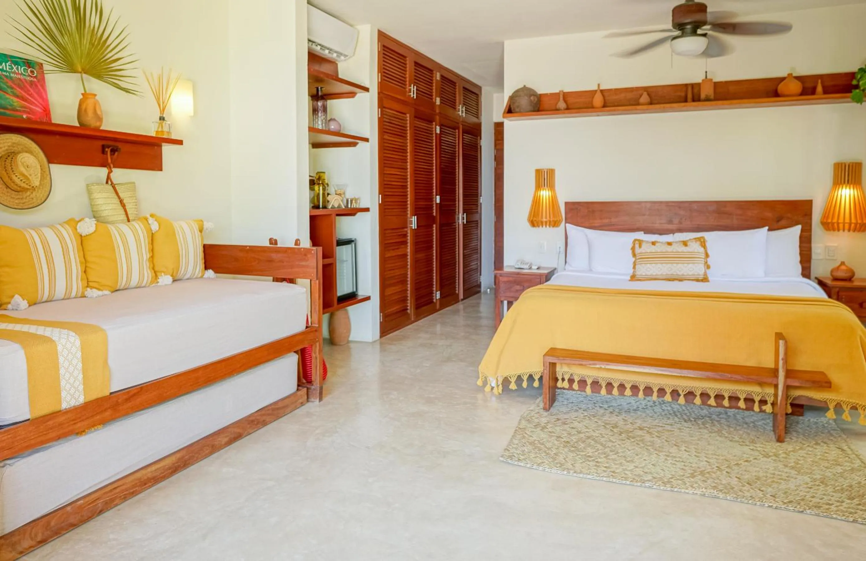 Bed in La Zebra Tulum, a Small Luxury Hotel