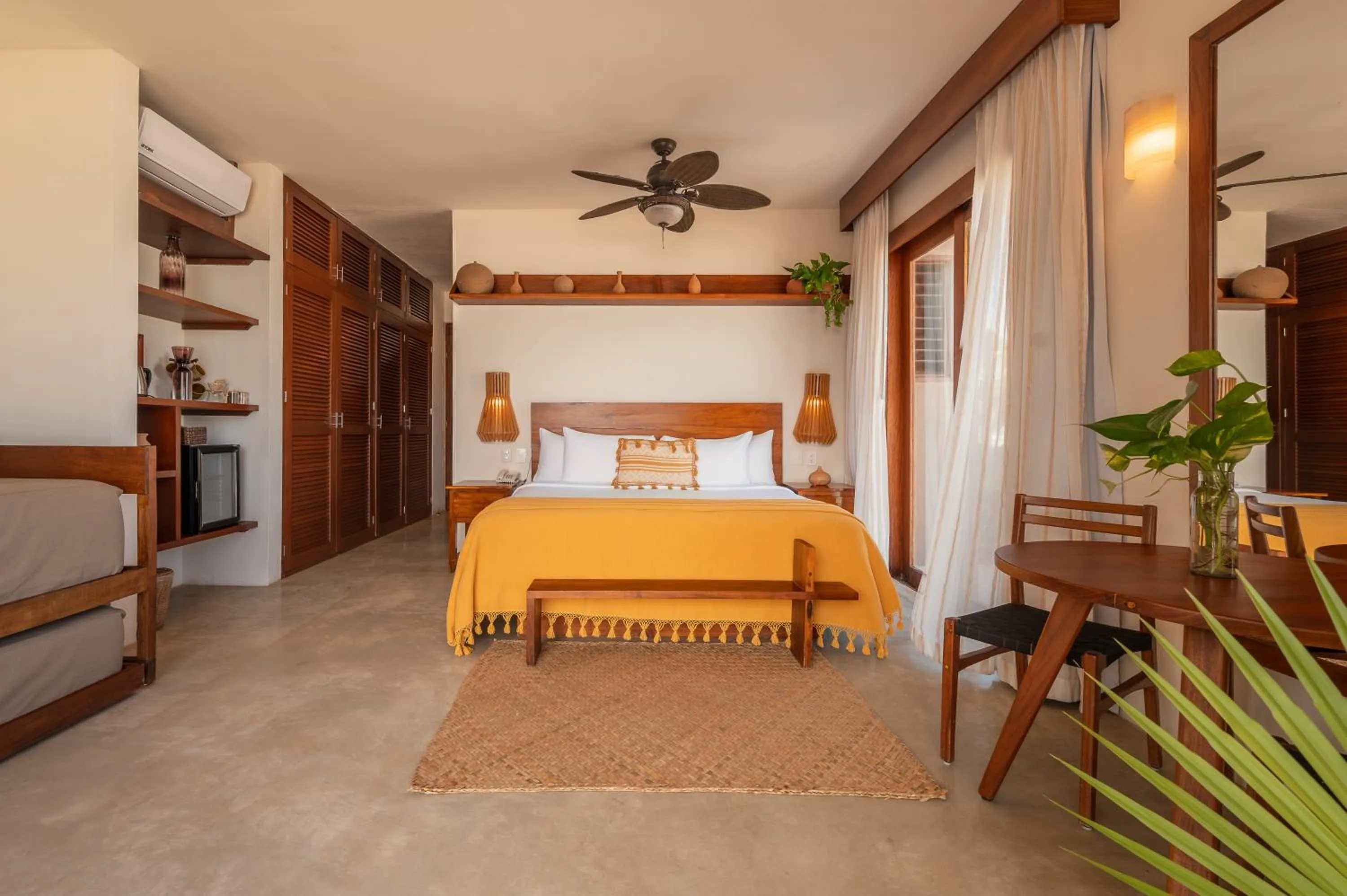Bed in La Zebra Tulum, a Small Luxury Hotel