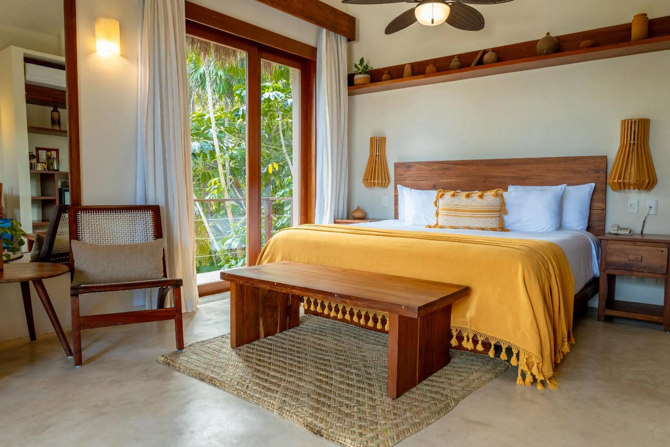 Bed in La Zebra Tulum, a Small Luxury Hotel