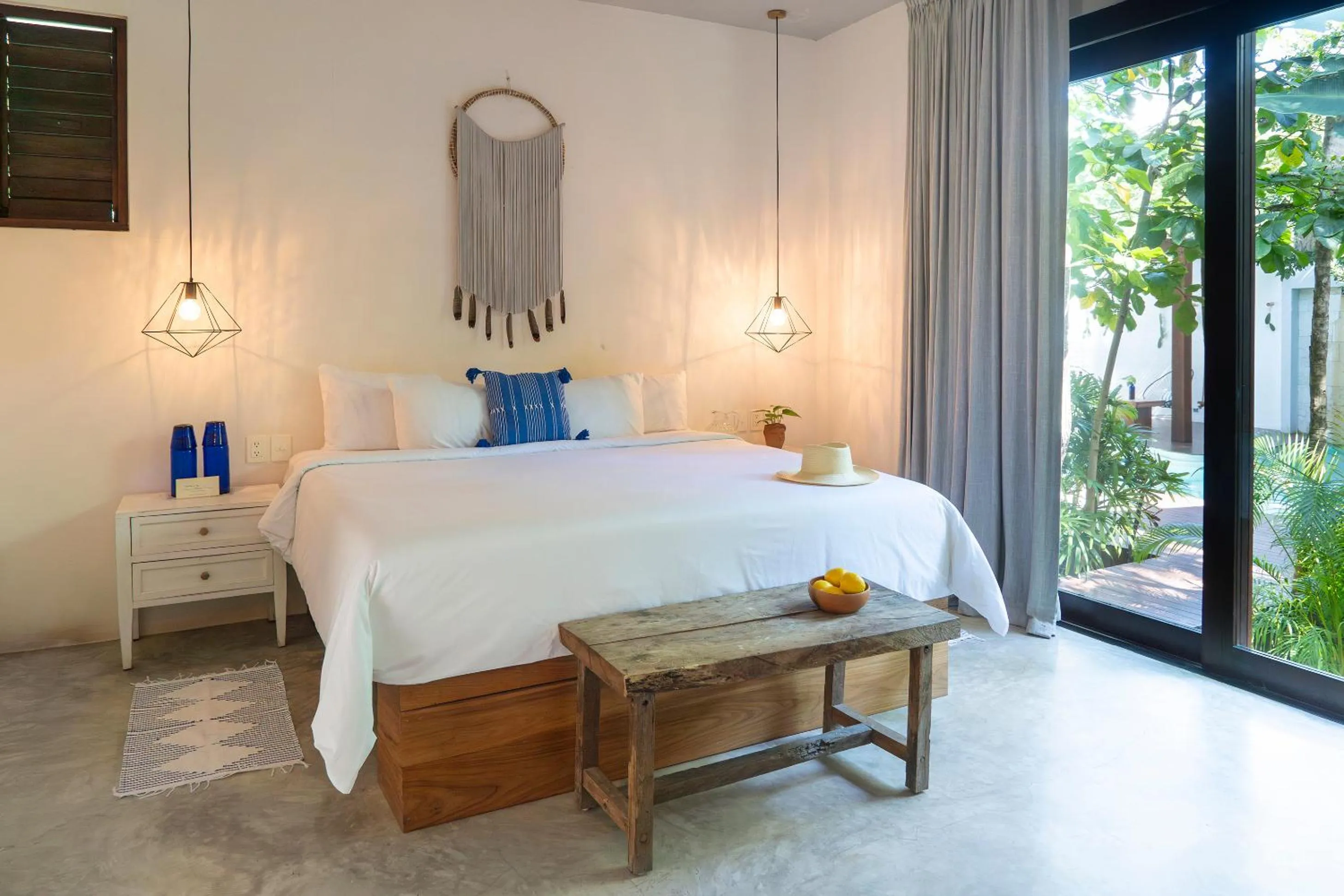 Bed in La Zebra Tulum, a Small Luxury Hotel