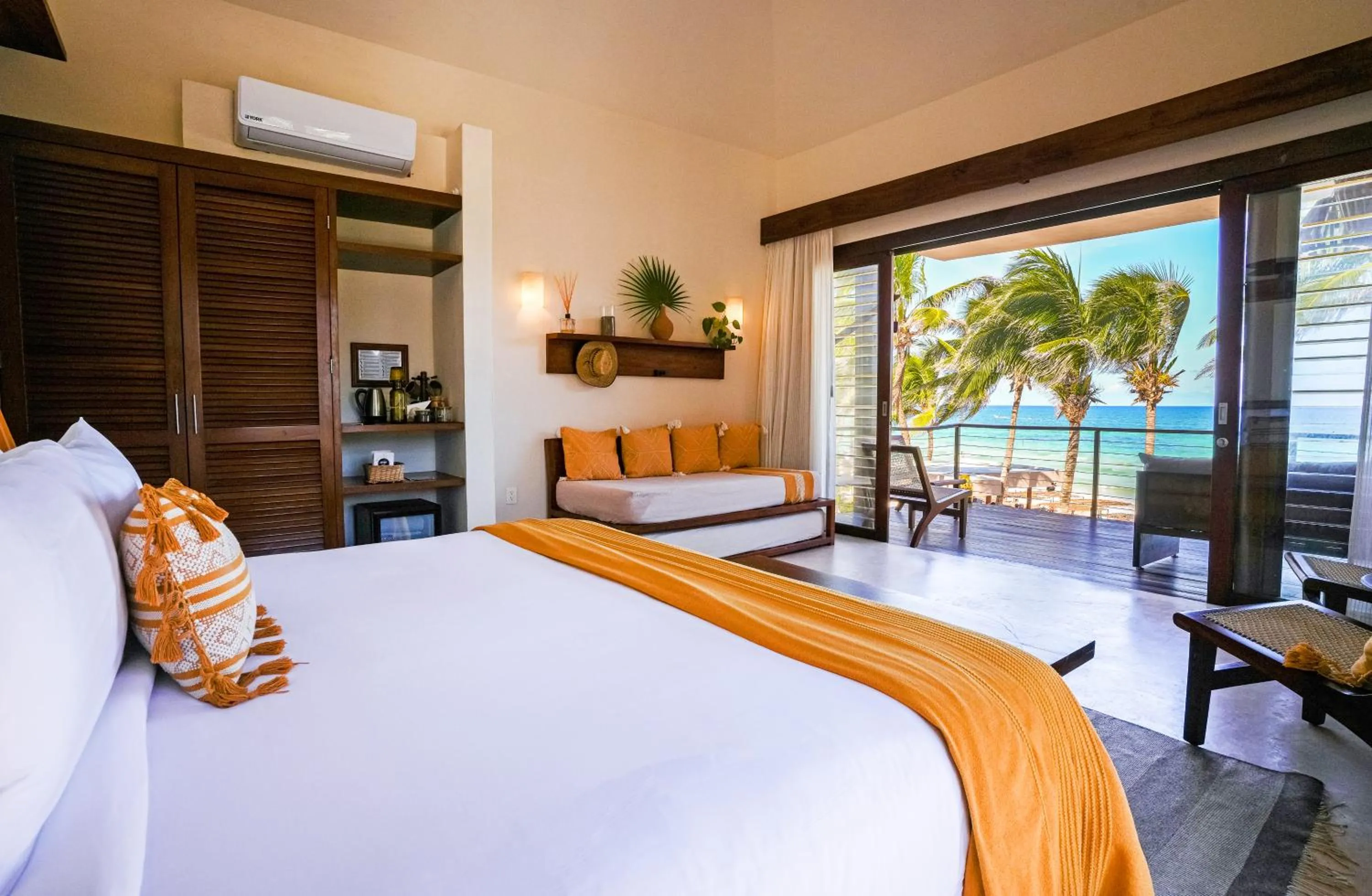 Bed in La Zebra Tulum, a Small Luxury Hotel