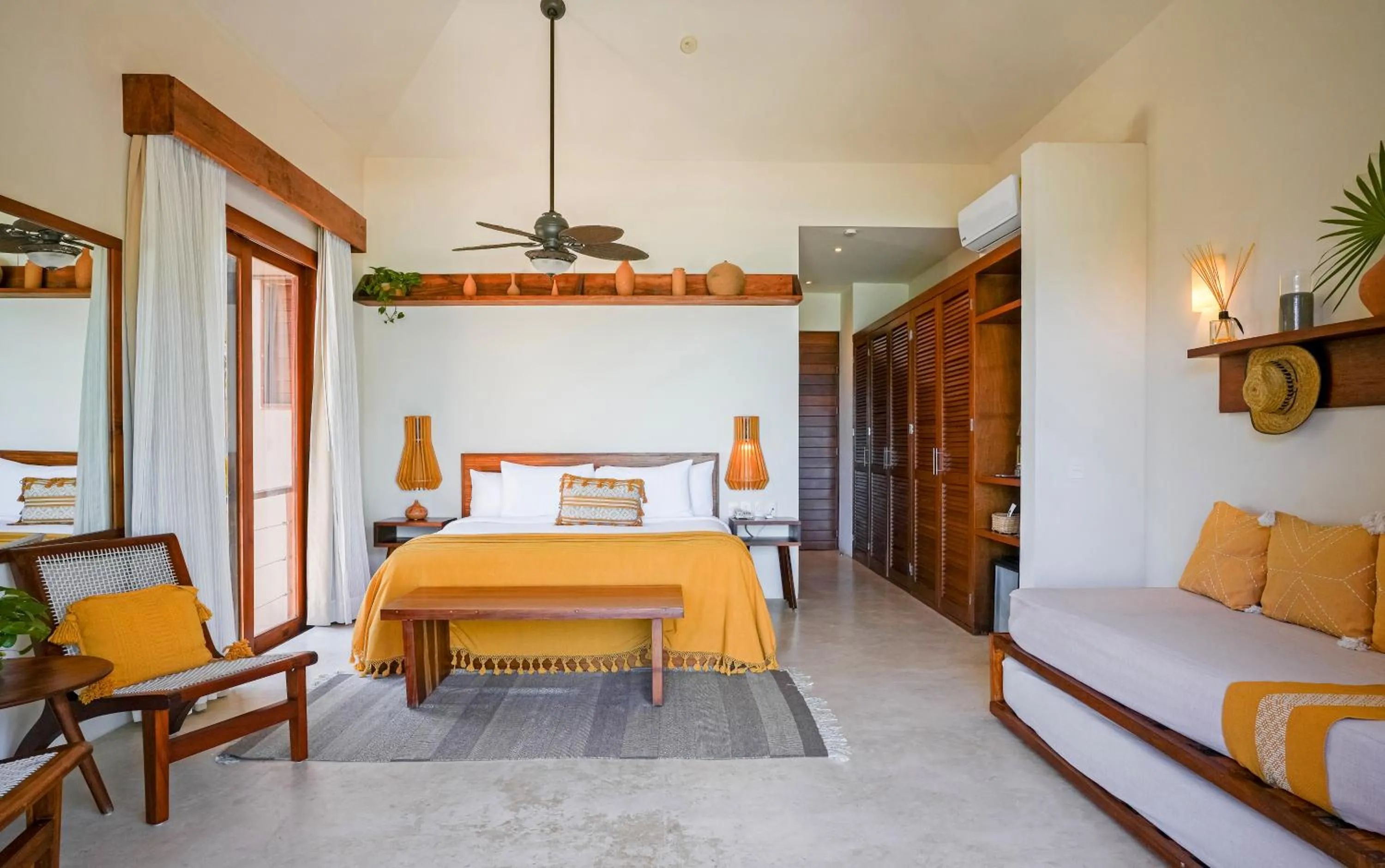 Bed in La Zebra Tulum, a Small Luxury Hotel