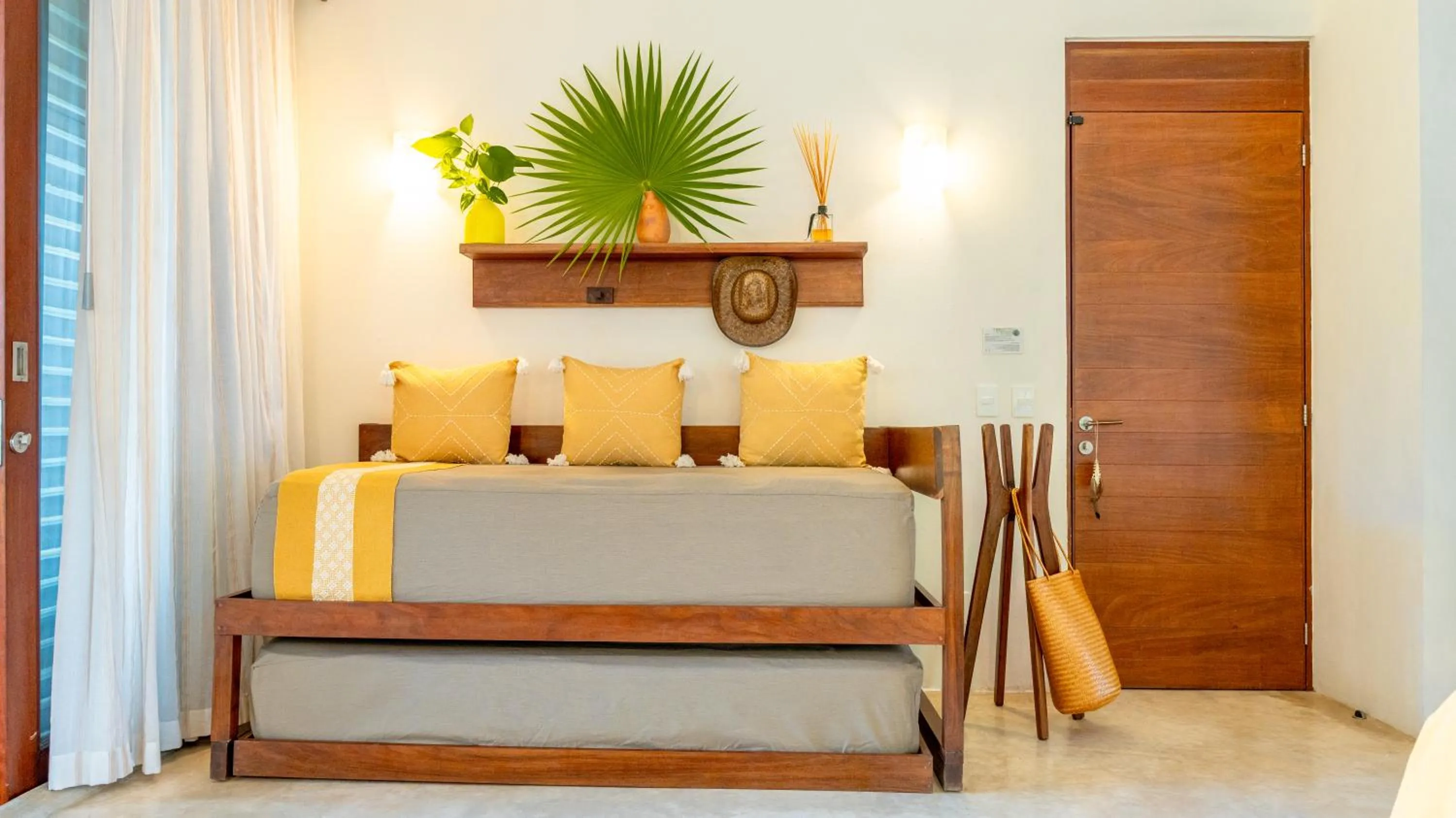 Bed in La Zebra Tulum, a Small Luxury Hotel
