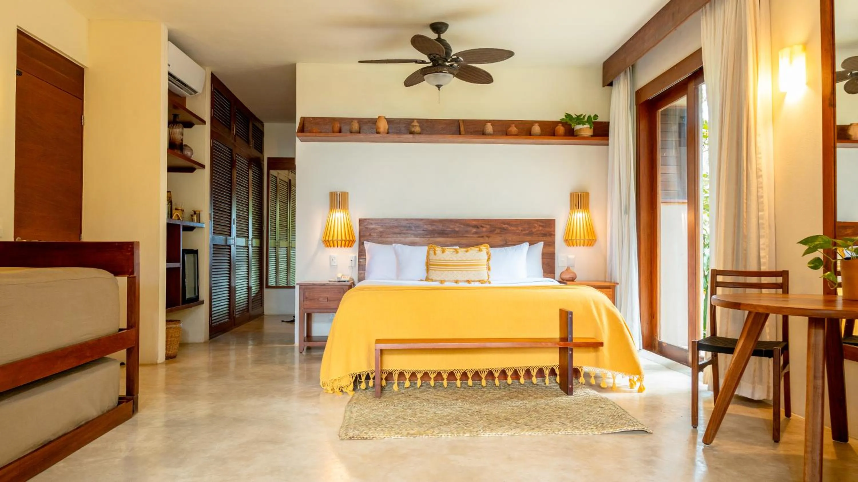 Bed in La Zebra Tulum, a Small Luxury Hotel