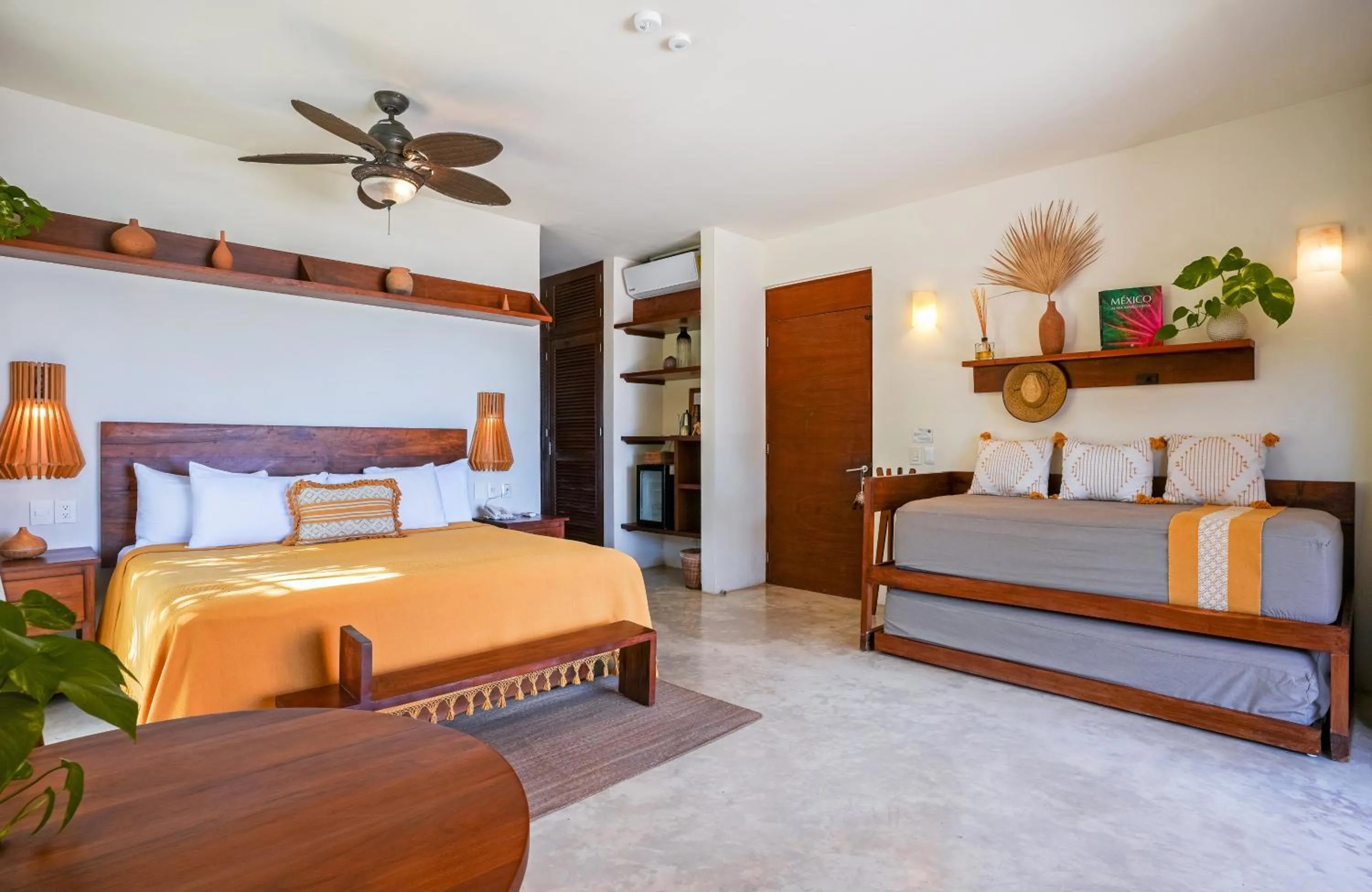 Bed in La Zebra Tulum, a Small Luxury Hotel