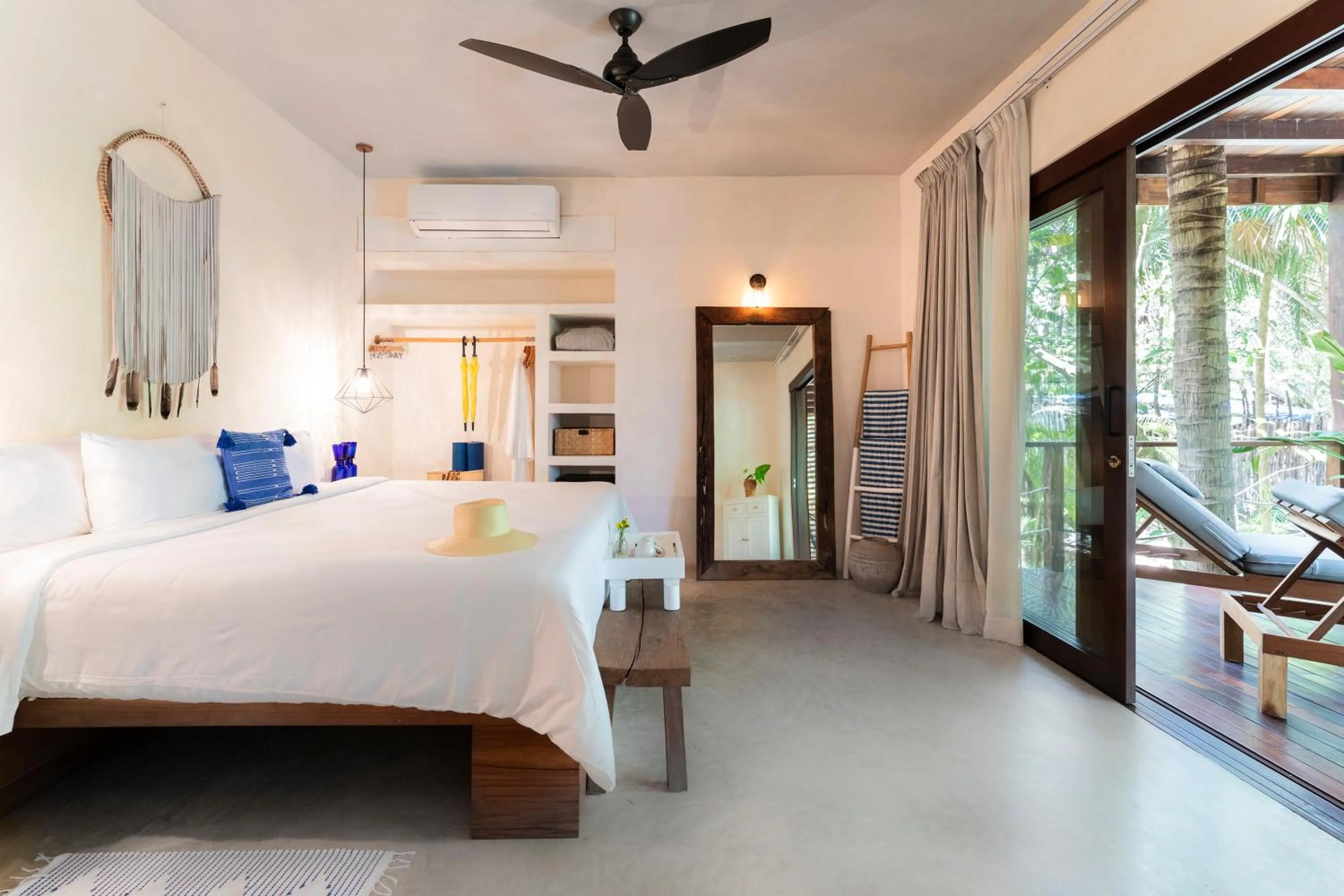 Bed in La Zebra Tulum, a Small Luxury Hotel