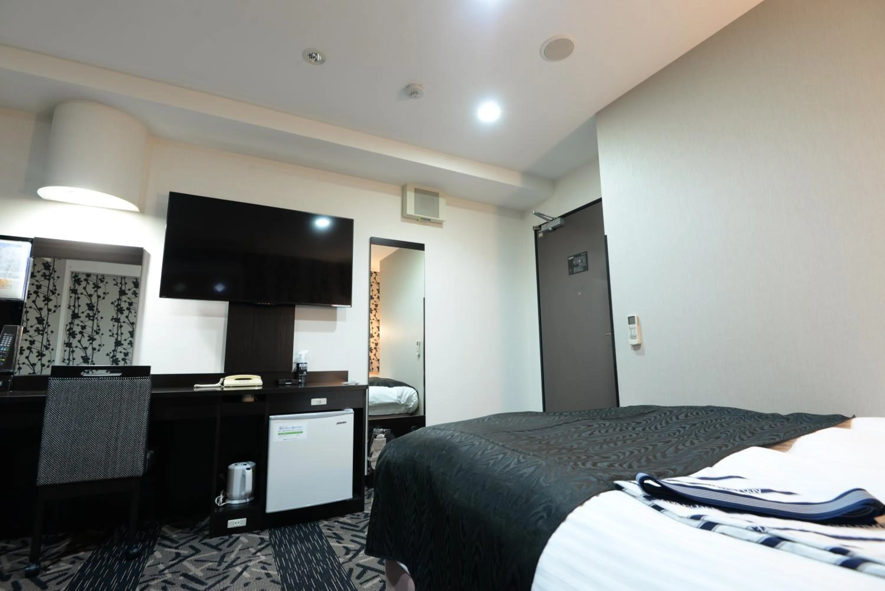 Photo of the whole room, Bed in APA Hotel Suzuka-Chuou