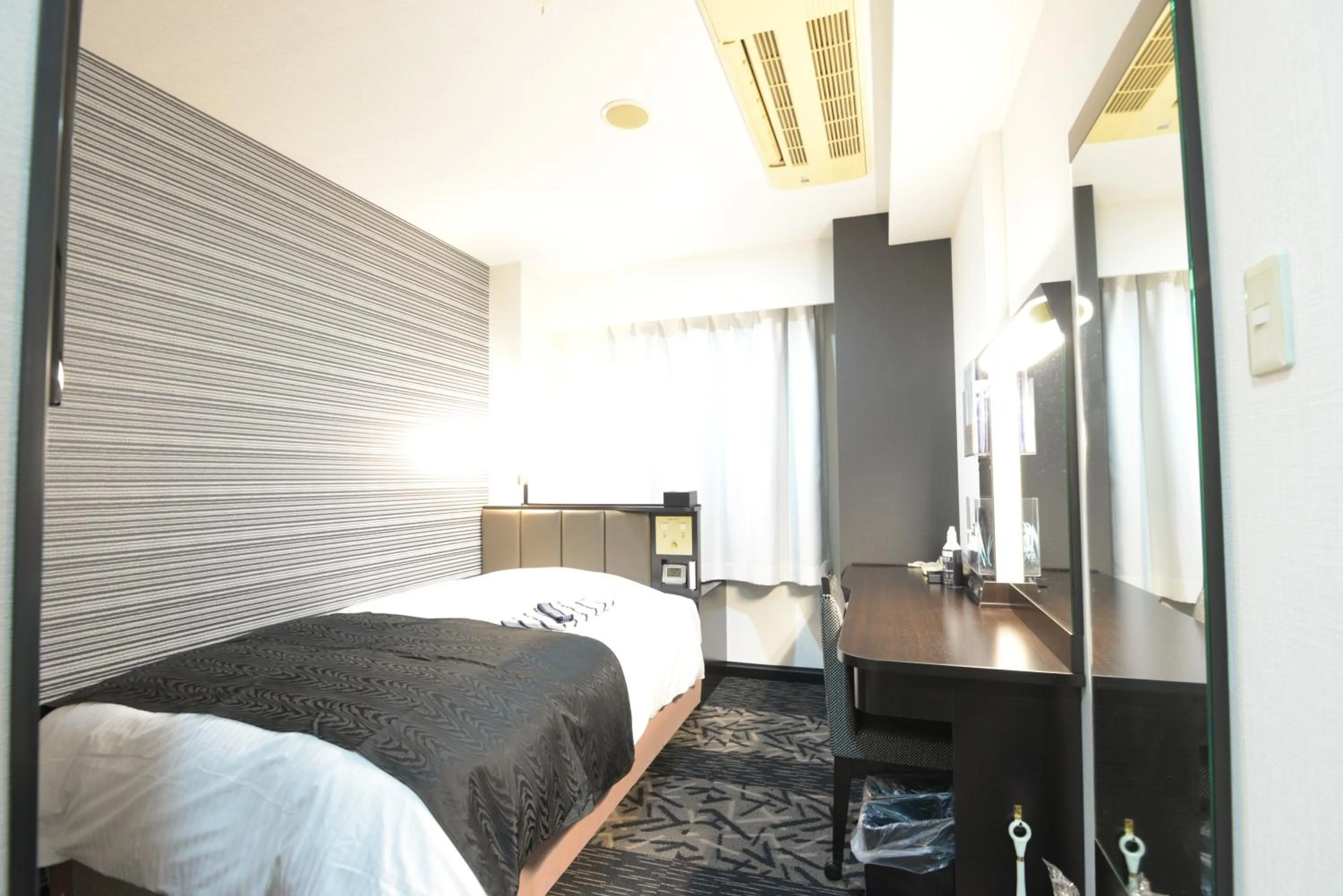 Photo of the whole room, Bed in APA Hotel Suzuka-Chuou