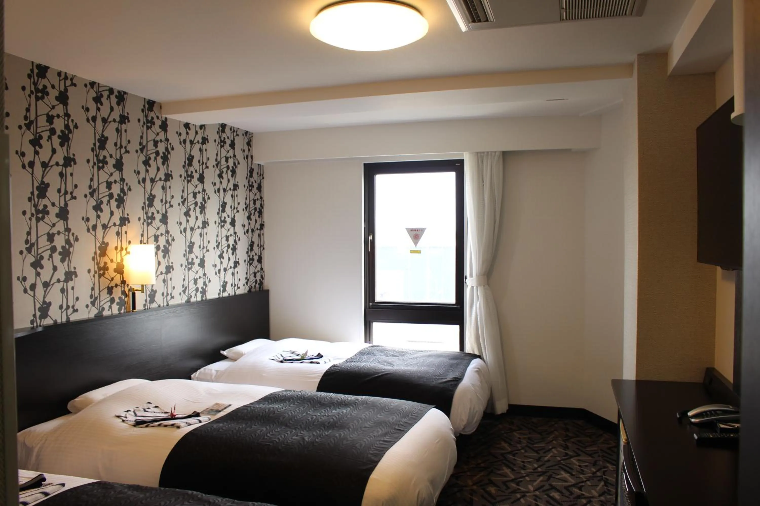 Photo of the whole room, Bed in APA Hotel Suzuka-Chuou