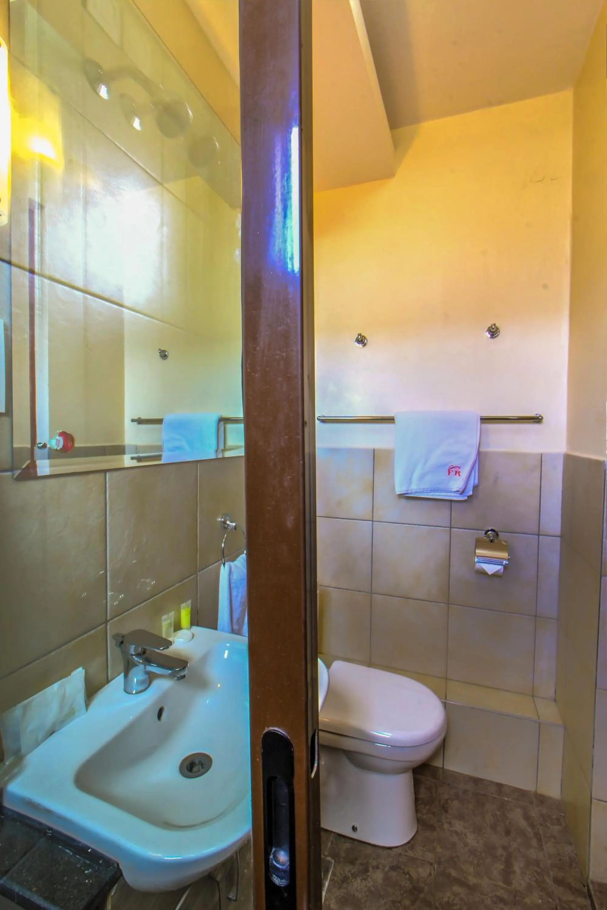 Toilet in Fedha Residences by Trianum