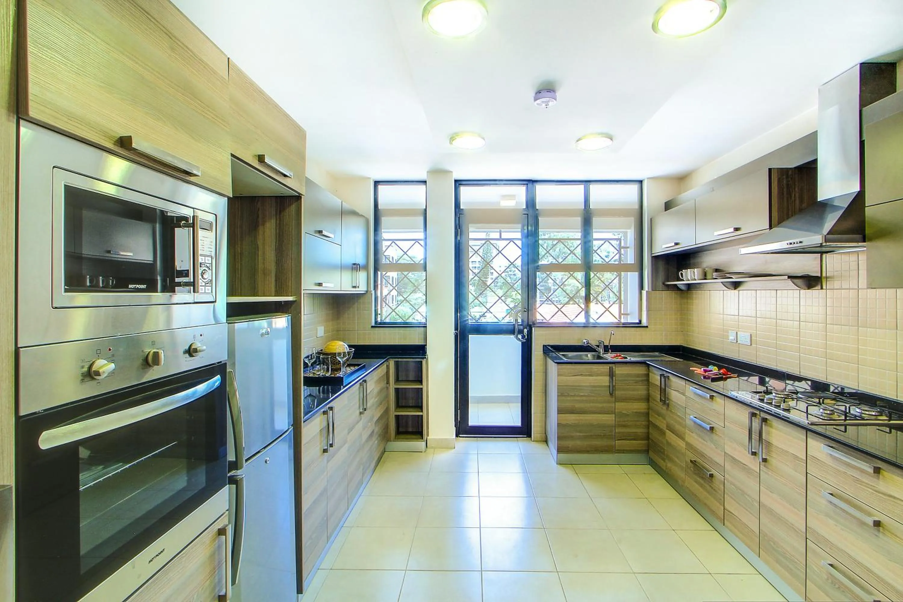 Kitchen or kitchenette in Fedha Residences by Trianum