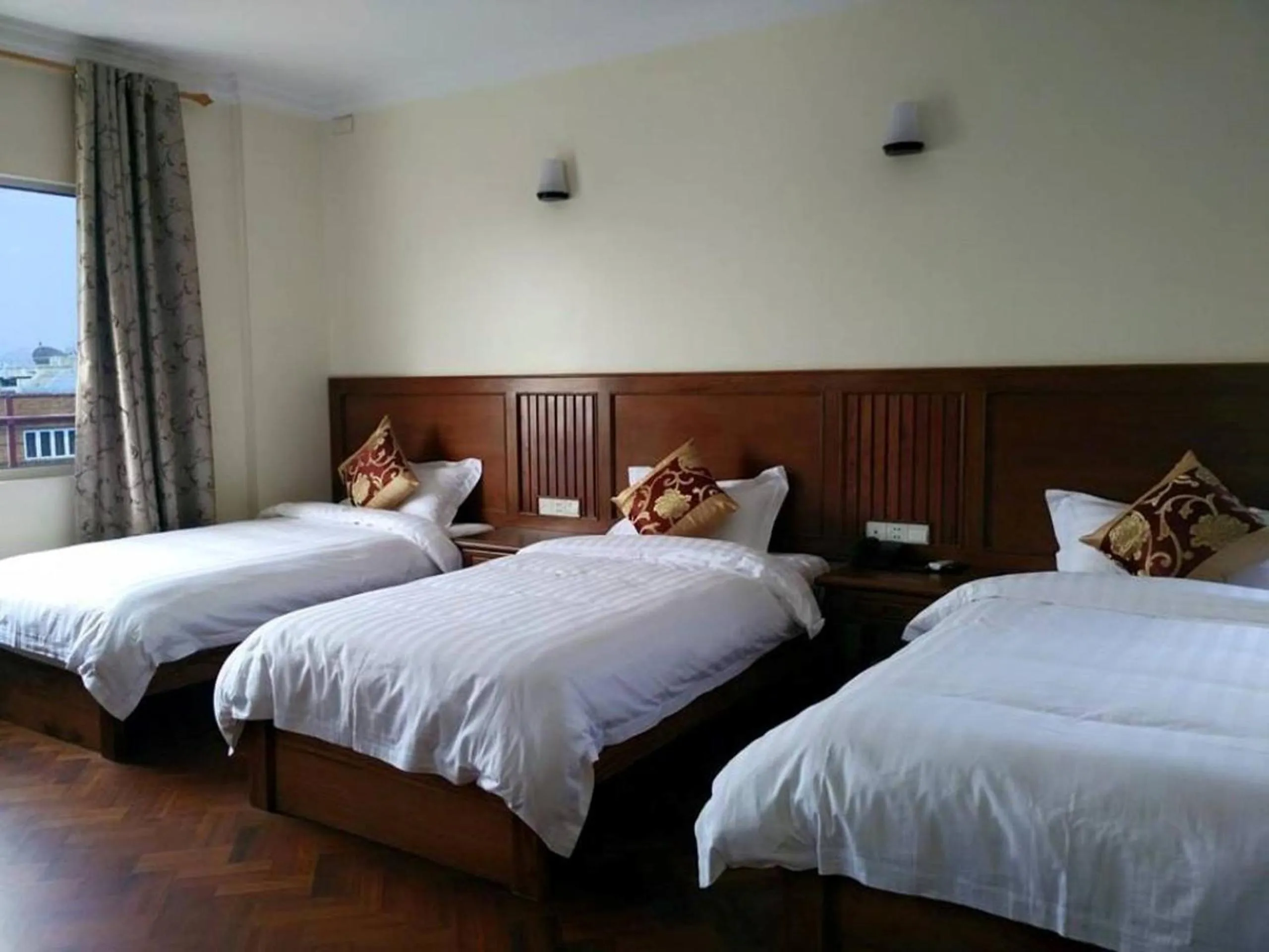 Bed in The Home Hotel