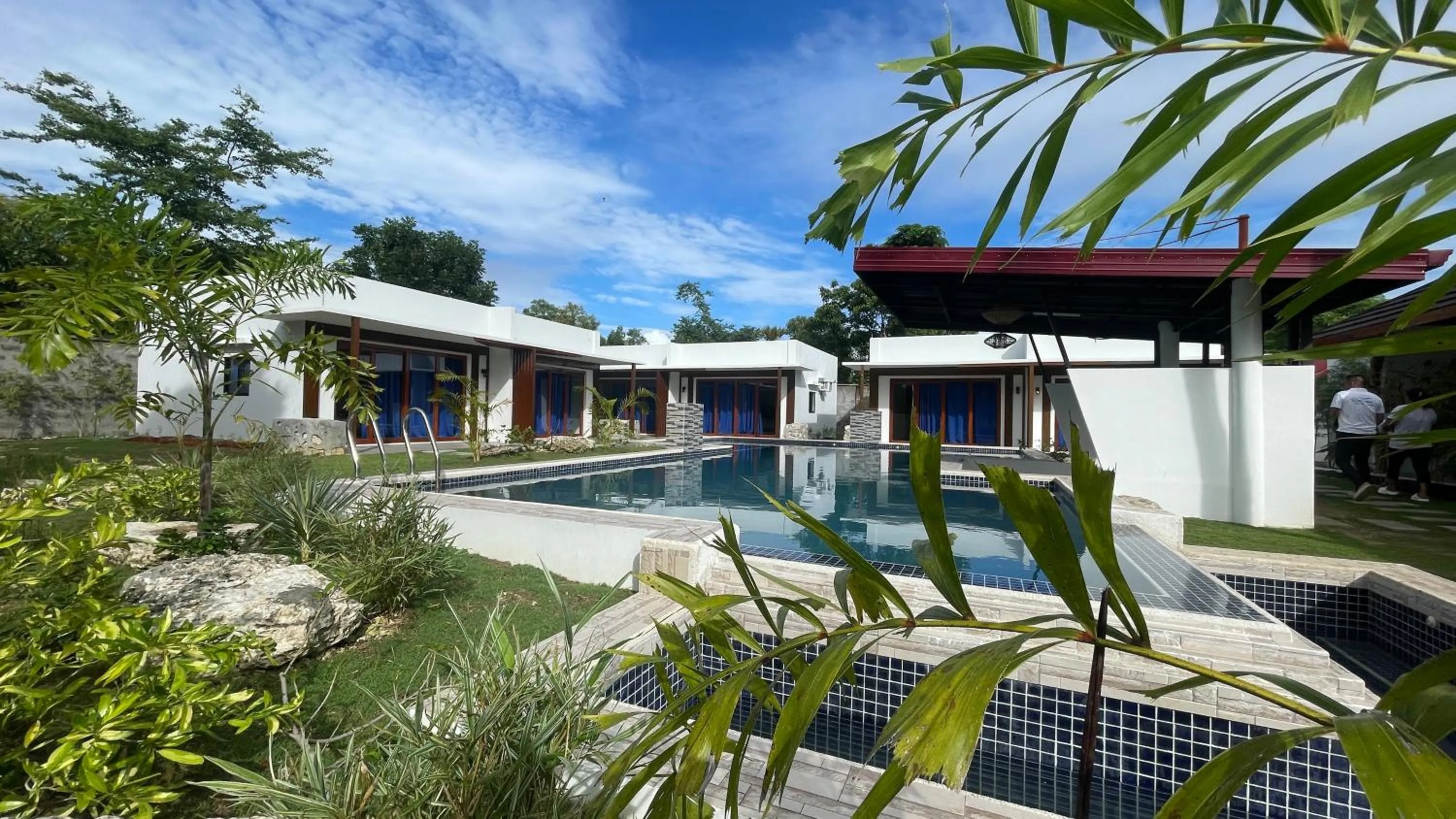 Property building in Bluewaves Hostel & Villa Panagsama by Hiverooms