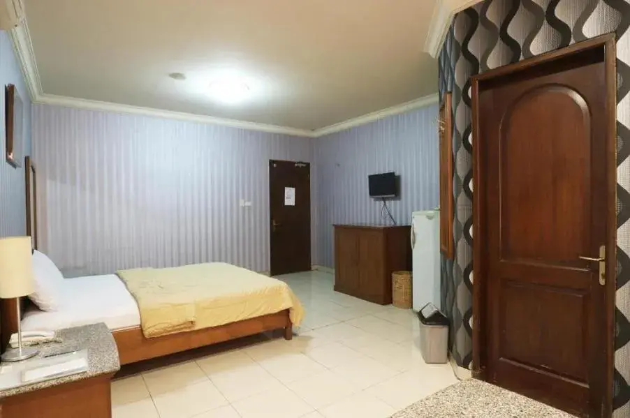 Bed in Hotel 678 Kemang Powered By Cocotel Bed in Hotel 678 Kemang Powered By Cocotel