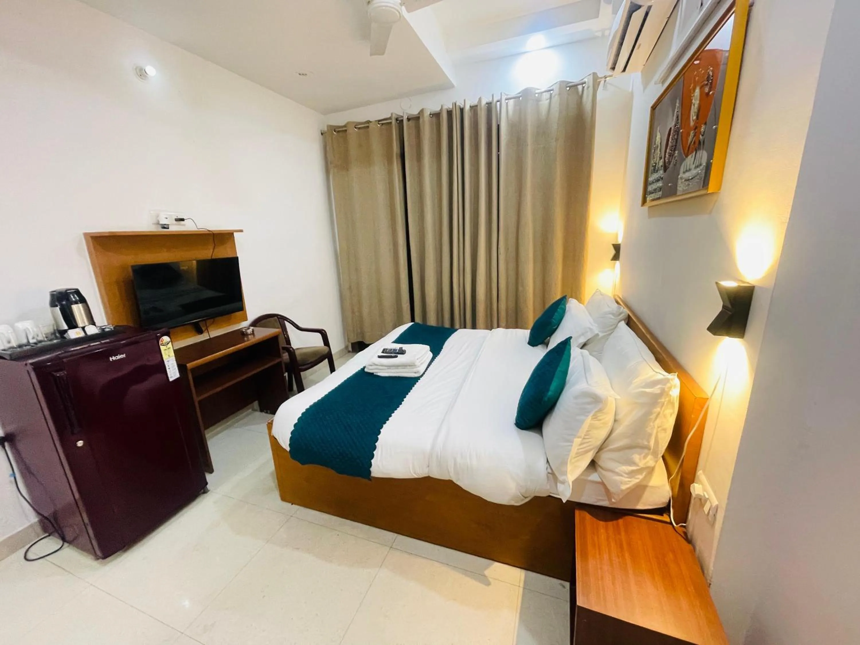 TV and multimedia, Bed in Aura Luxury studios near Artemis hospital Gurugram