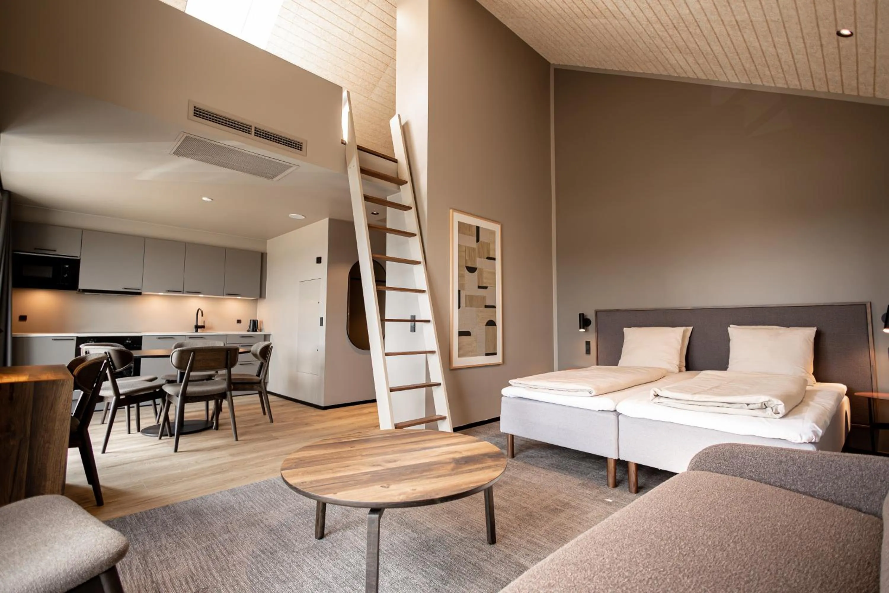 Dining area, Bed in Hotel Melfarhus