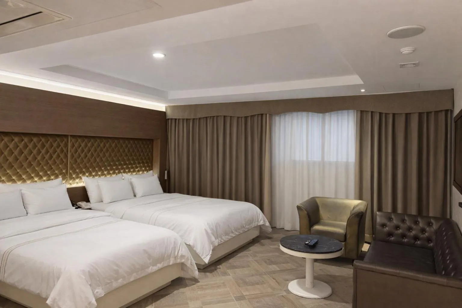 Bed in Zenith Tourist Hotel