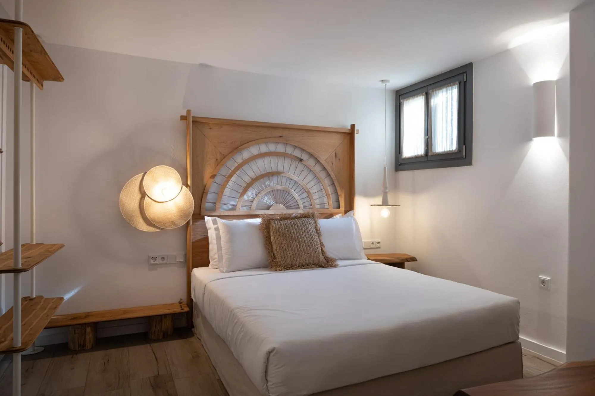 Bed in Kosmitis Suites & Villas