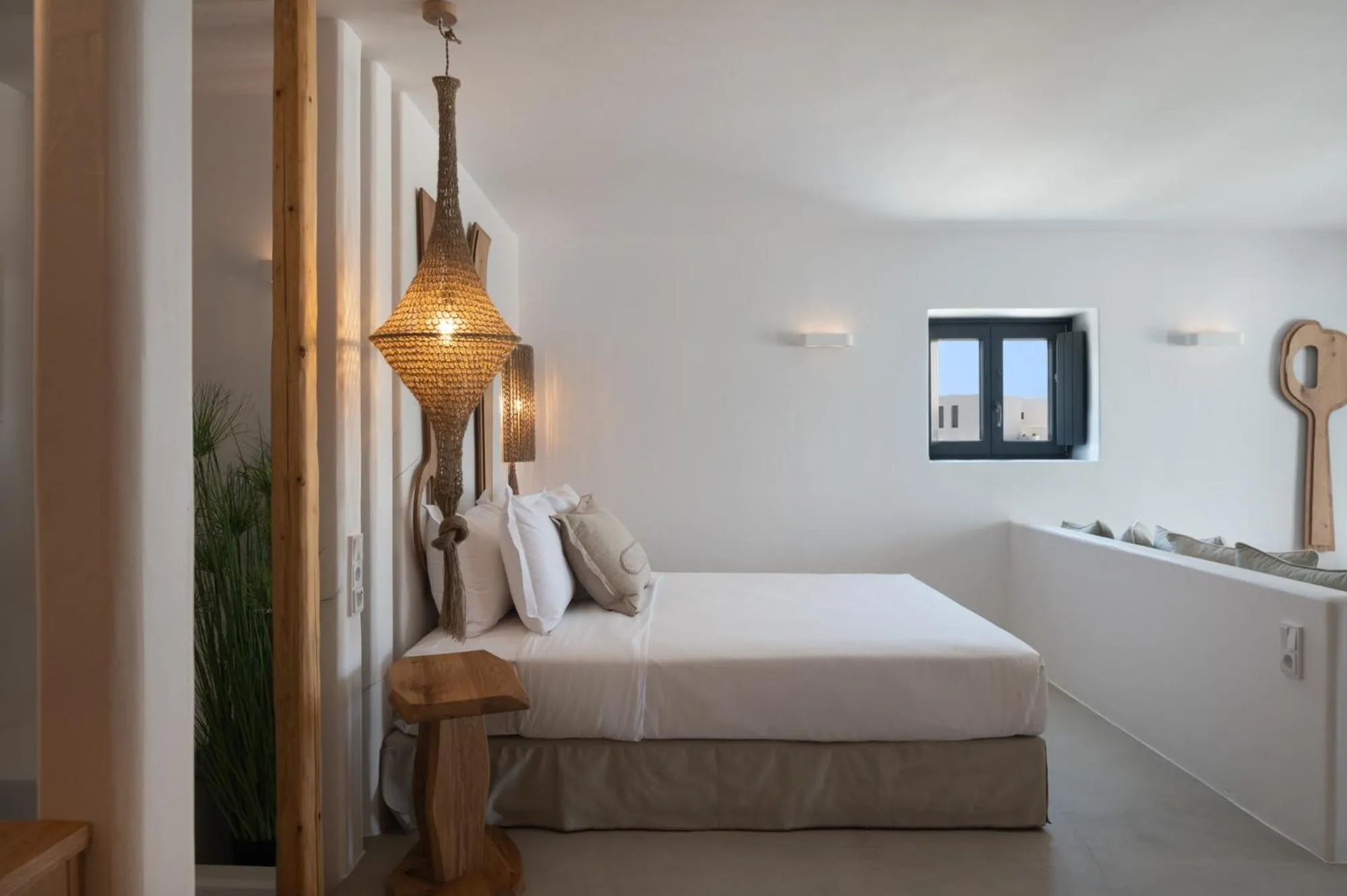 Bed in Kosmitis Suites & Villas