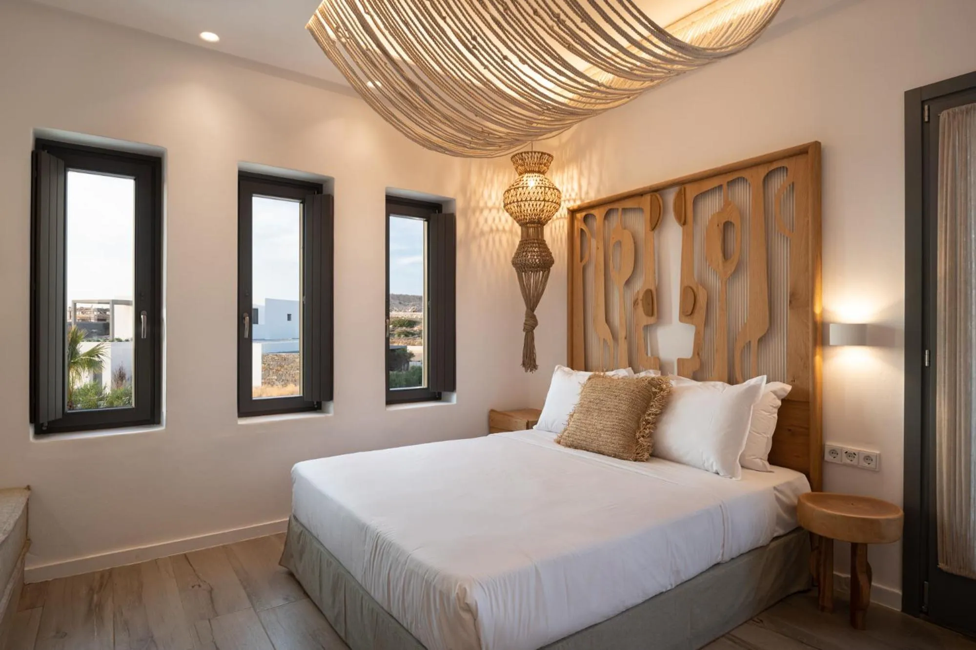 Bed in Kosmitis Suites & Villas