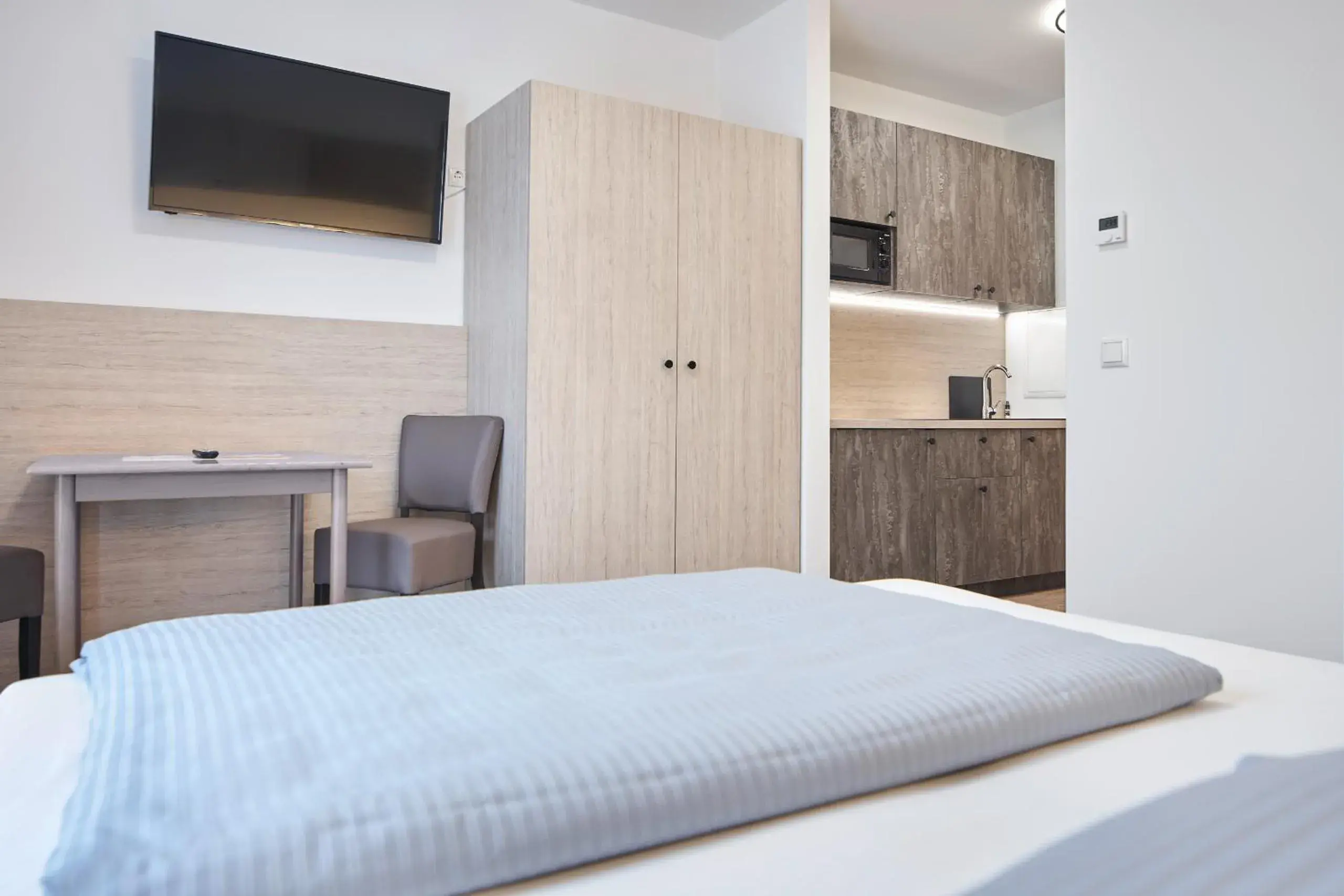 TV and multimedia, Bed in Bader Aparthotel TV and multimedia, Bed in Bader Aparthotel