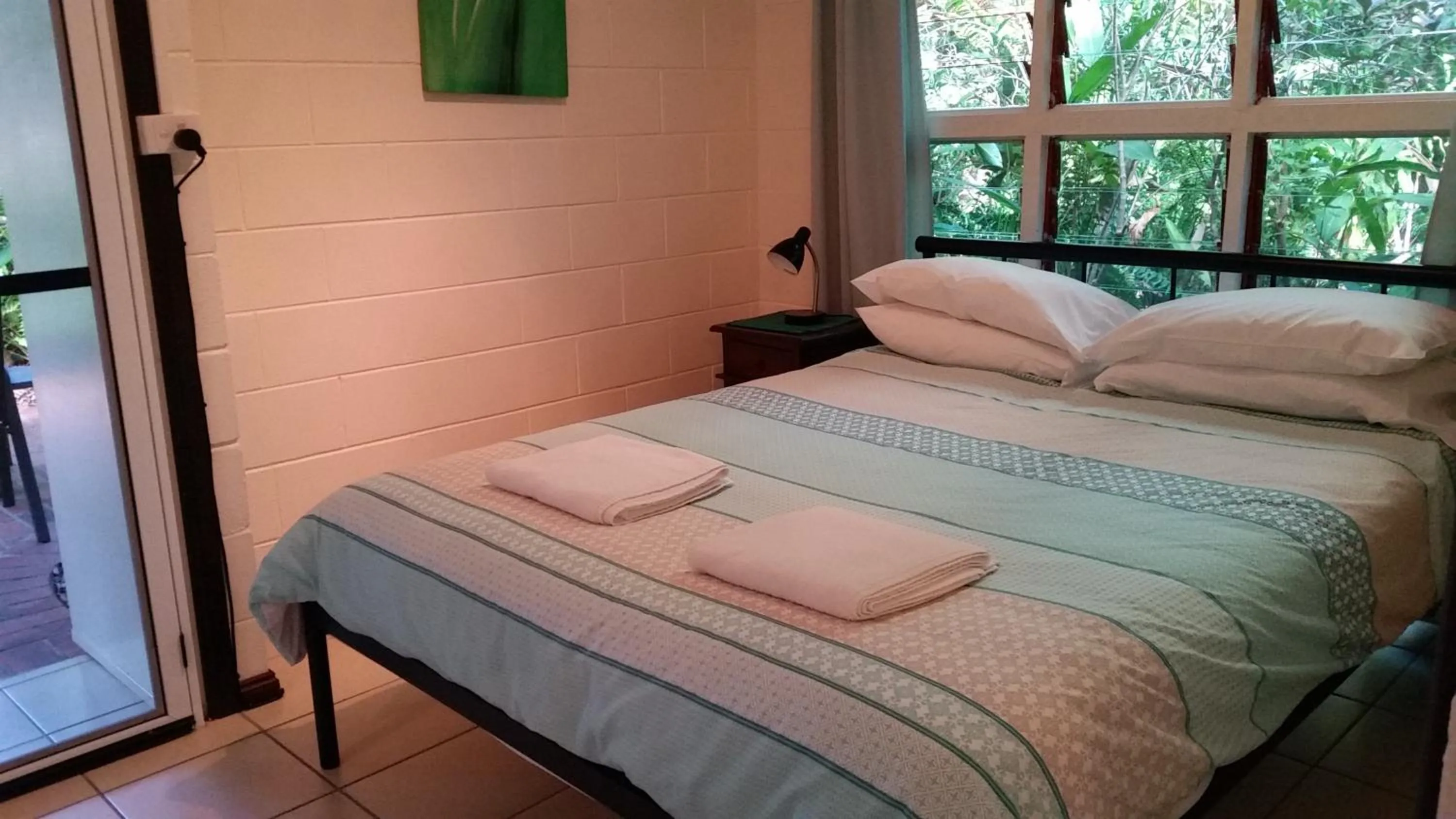 Bed in Shambhala Retreat Magnetic Island Cottages
