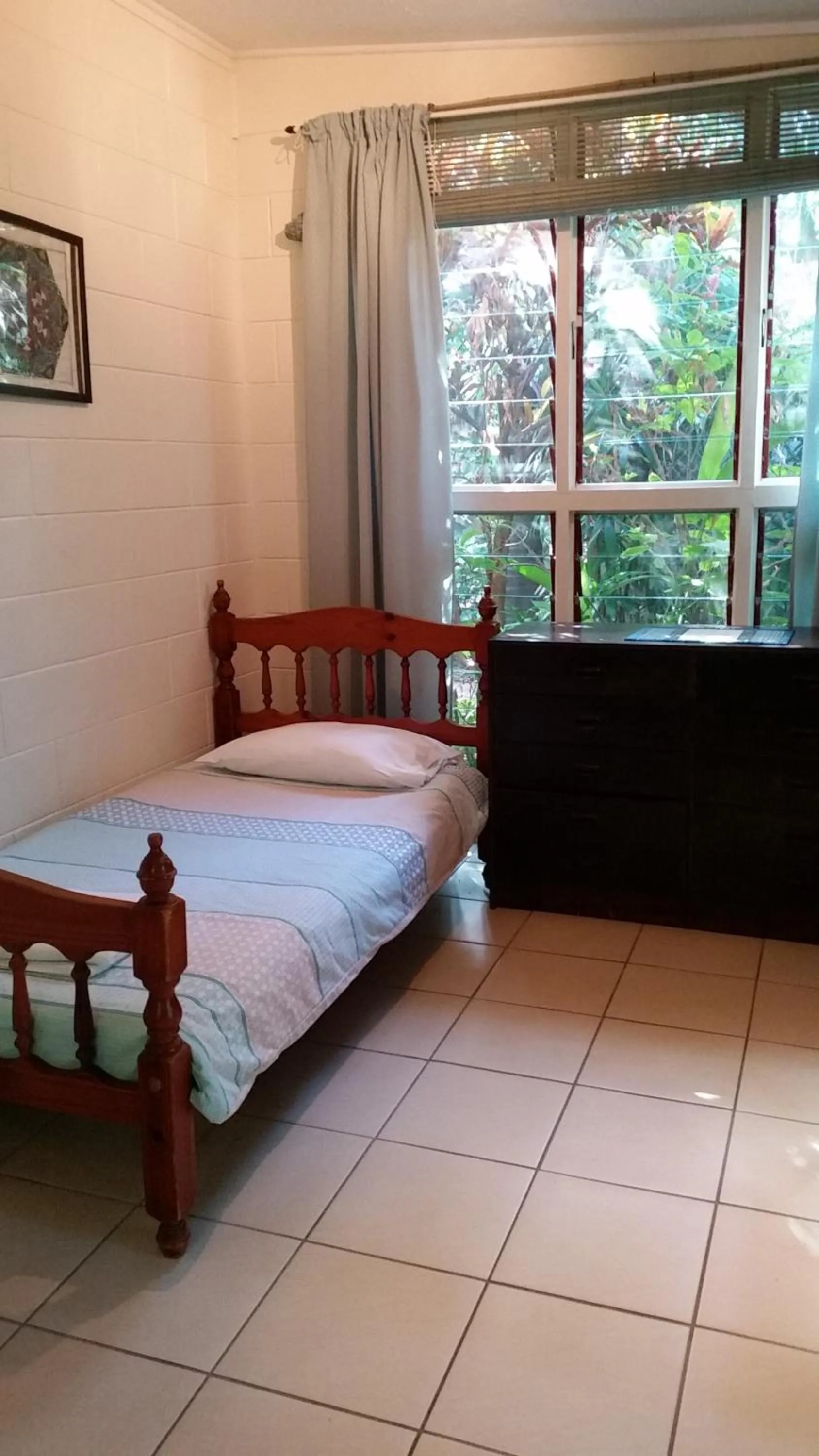 Bed in Shambhala Retreat Magnetic Island Cottages