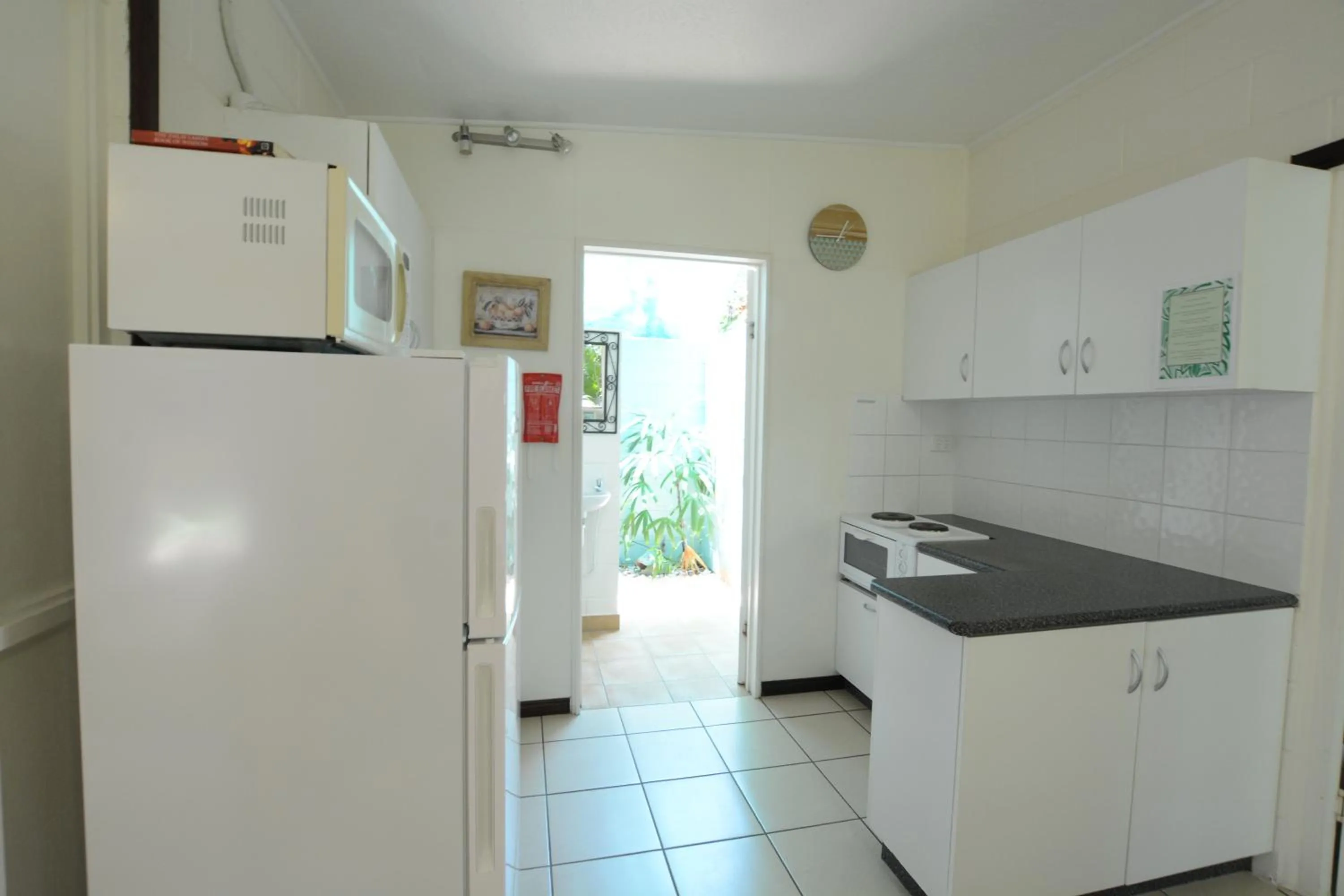 Kitchen or kitchenette in Shambhala Retreat Magnetic Island Cottages